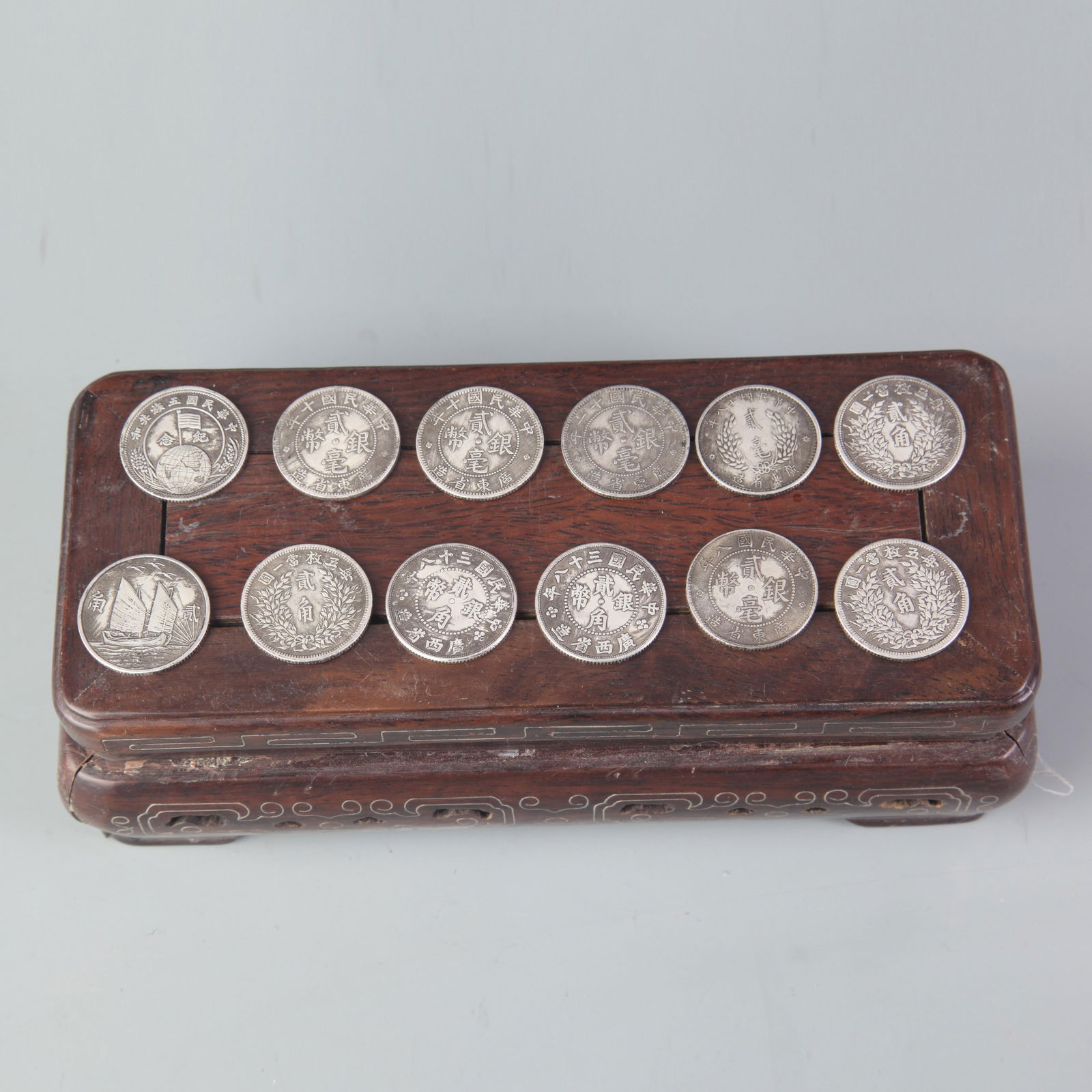 GROUP OF TWELVE SMALL CHINESE COIN: Qing Dynasty; Diameter: 0.7 inch;