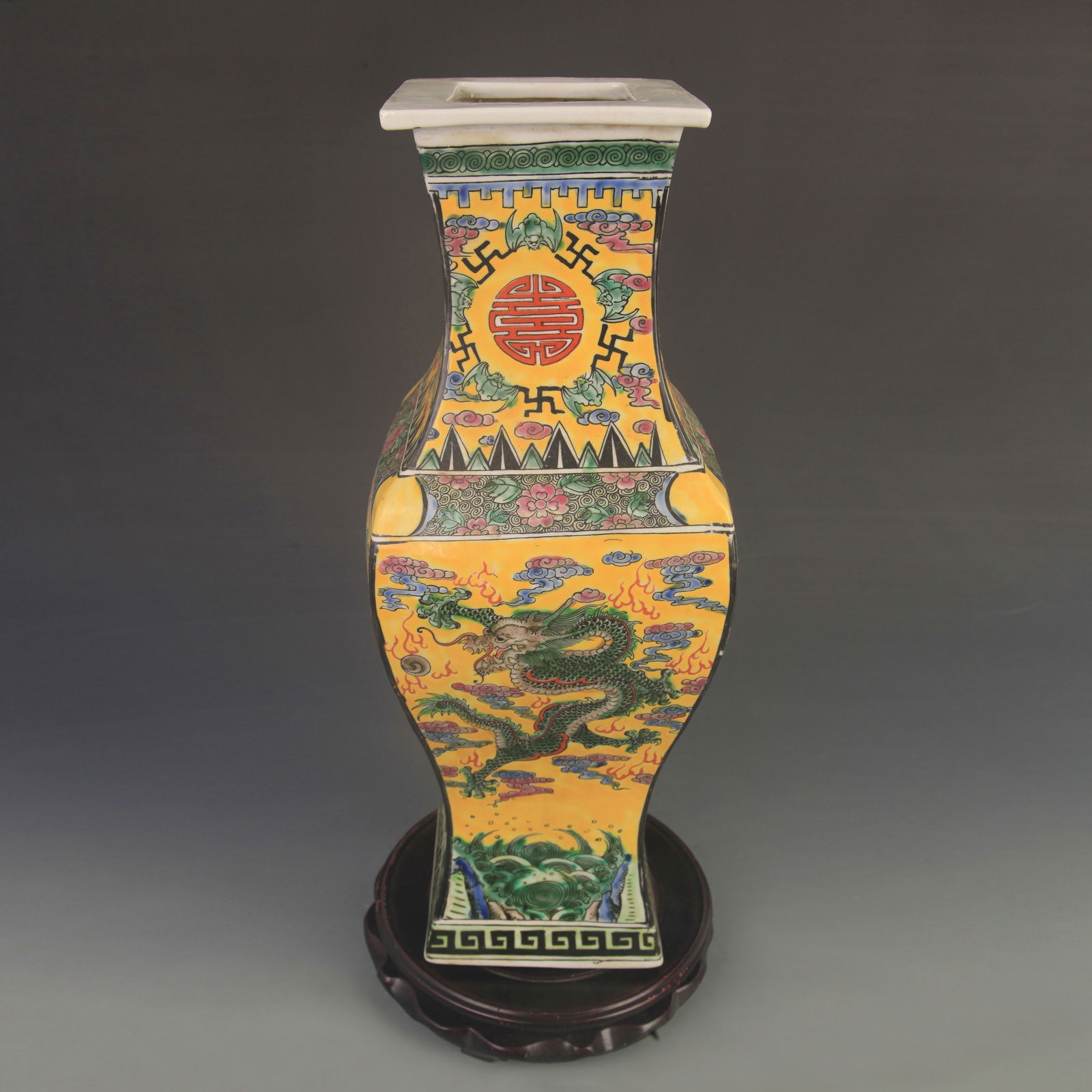 FAMILLE ROSE SQUARE VASE WITH YELLOW GROUND AND DRAGON MOTIF: Qing Dynasty; Kang Xi Period; High: 16.0 inch; Width: 5.70 inch;