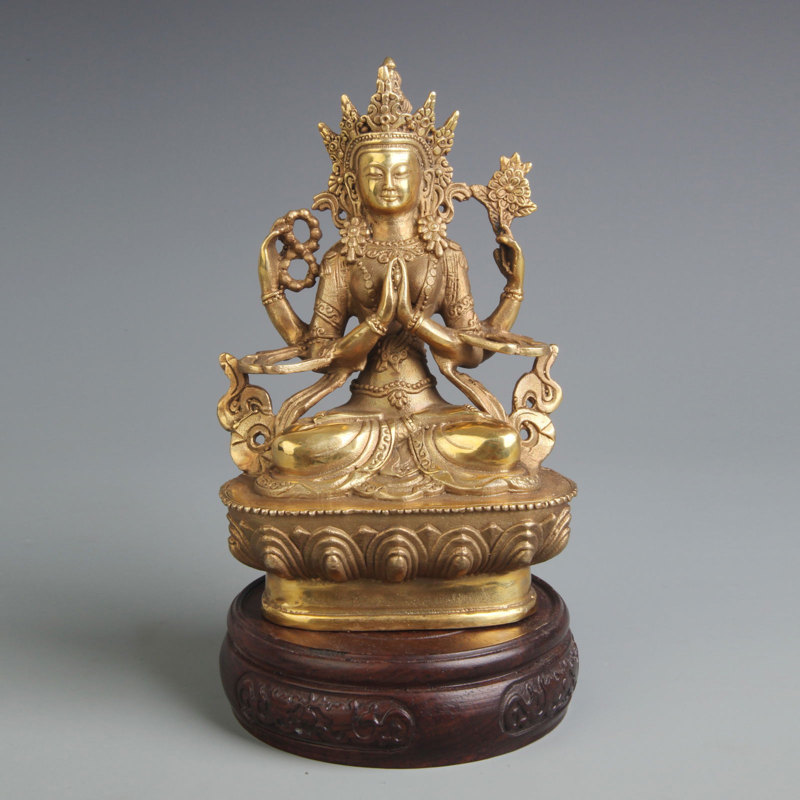 GILDED BRONZE FOUR-ARMED AVALOKITESHVARA STATUE: 20th Century; High: 6.00 inch; Width: 3.80 inch