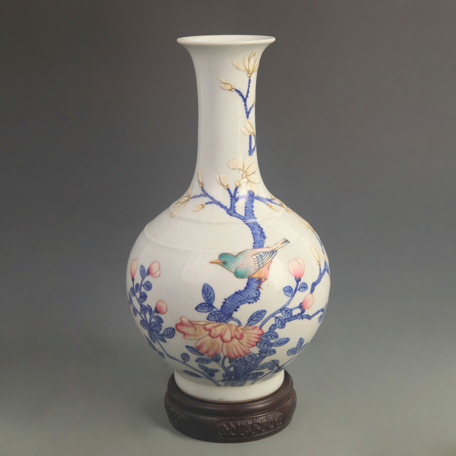 ENAMEL COLOR PAINTED FLORAL AND BIRD PATTERN PORCELAIN VASE: Qing Dynasty Qian Long Period; High: 10.3 inch; Diameter: 5.80 inch