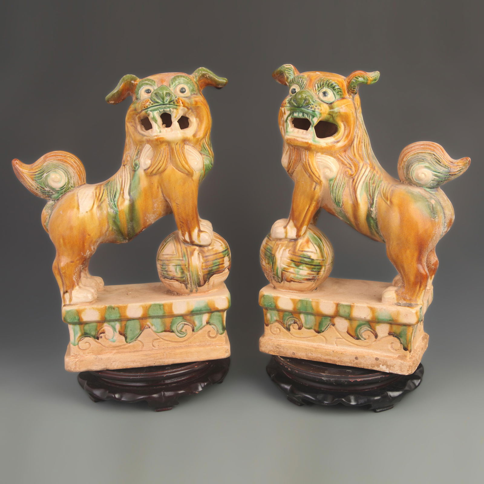 PAIR OF SANCAI POTTERY GUARDIAN LIONS: Tang Dynasty Style; High: 15.5 inch; Width: 8.00 inch;