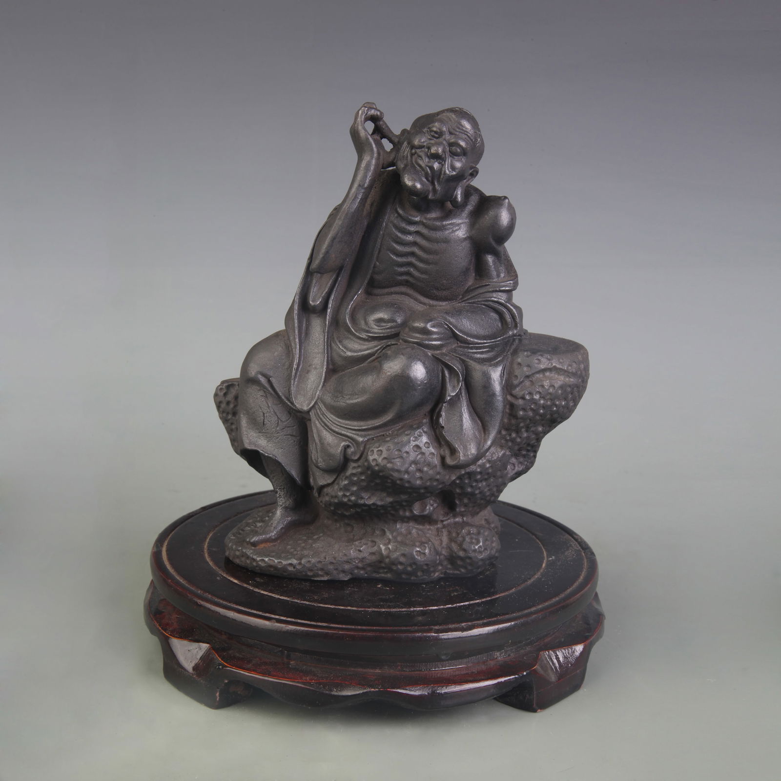 A FINE CAST IRON ARHAT FIGURE: Qing Dynasty; Width: 5.5 inch; High: 6.8 inch