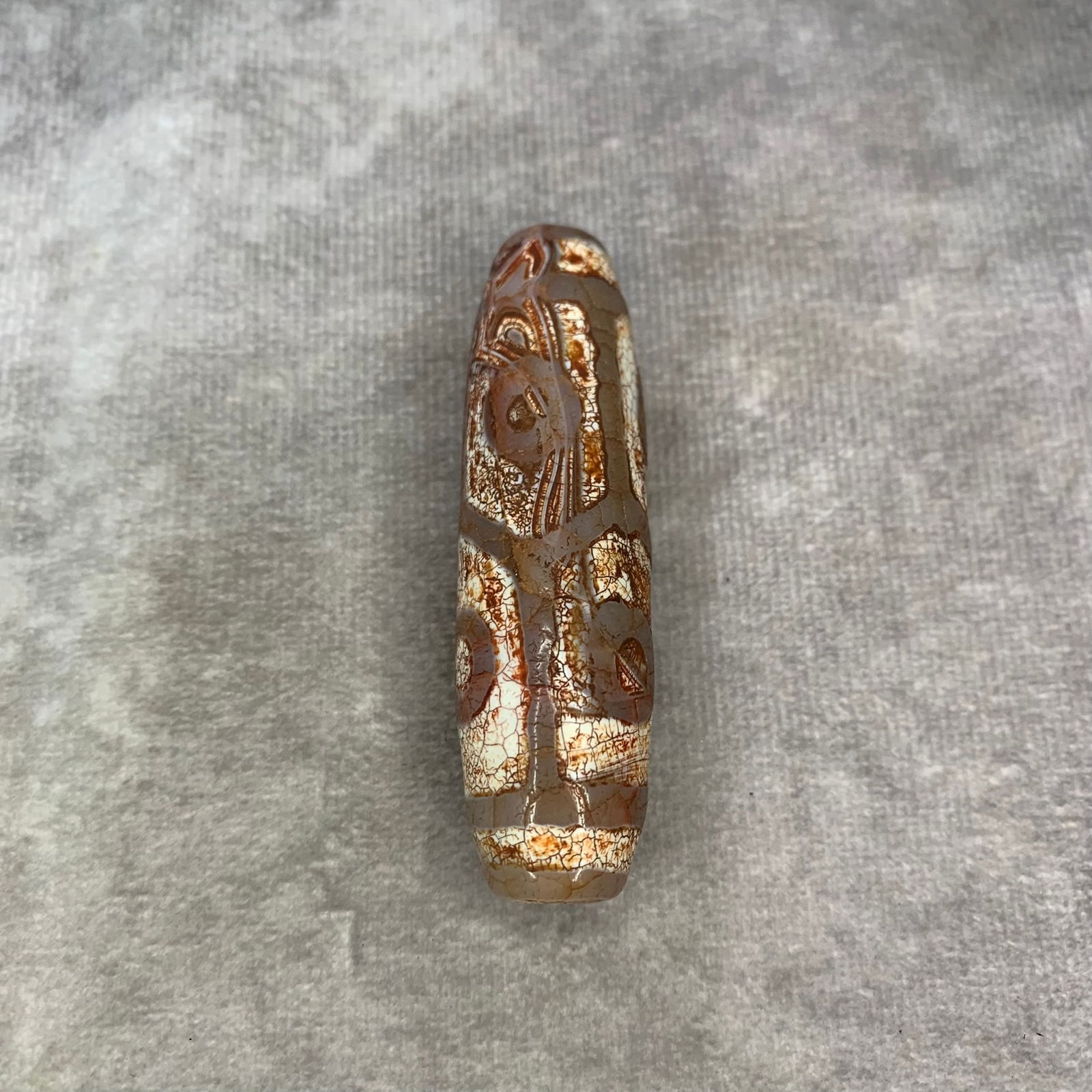 A FINE TIBETAN TIAN ZHU PENDANT: Modern; High: 2.6 inch; Diameter: 0.7 inch