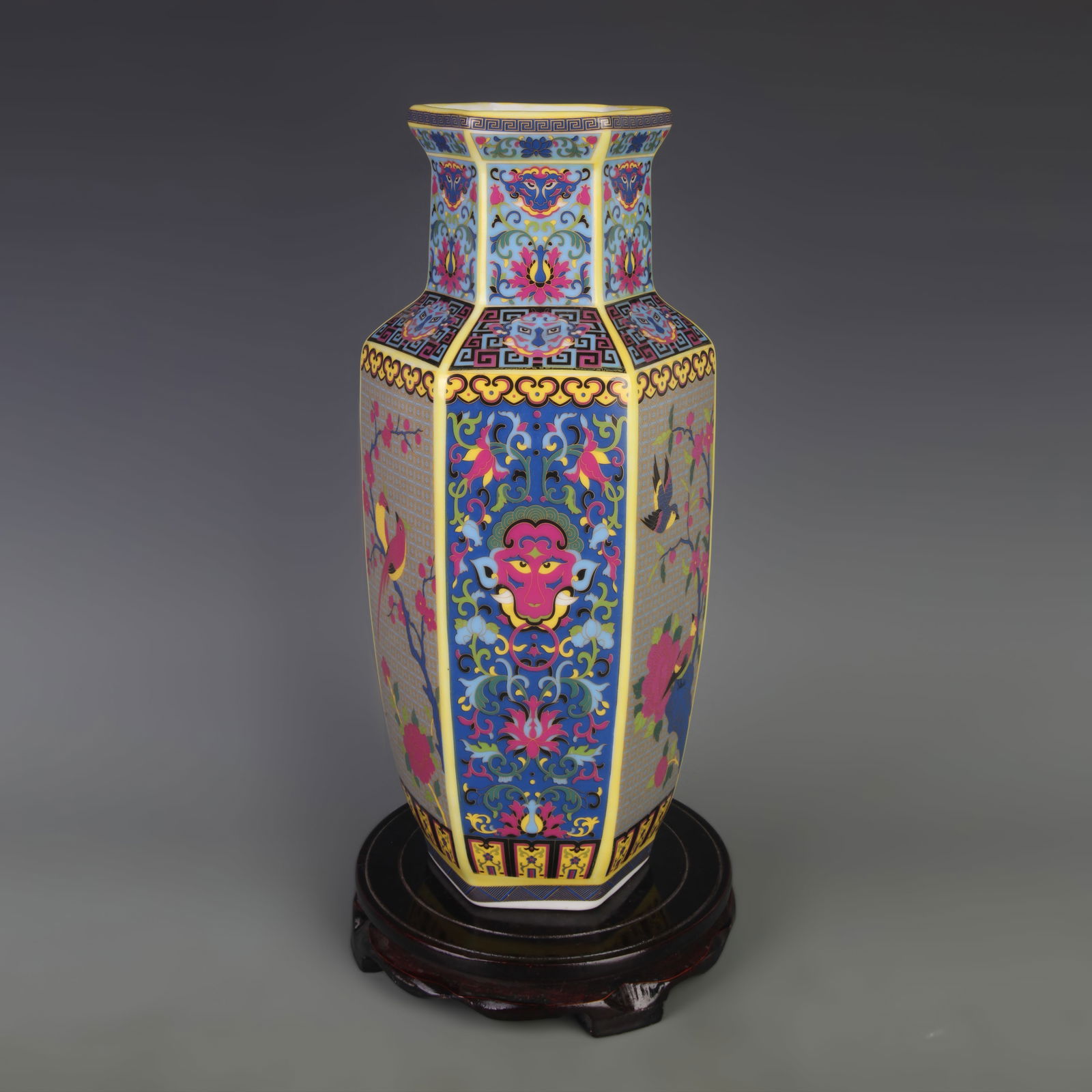 A FINE FAMILLE ROSE FLORAL AND BIRD PATTERN HEXAGONAL PORCELAIN VASE: Qing Dynasty Yong Zheng Period; Width: 5.8 inch; High: 13.2 inch