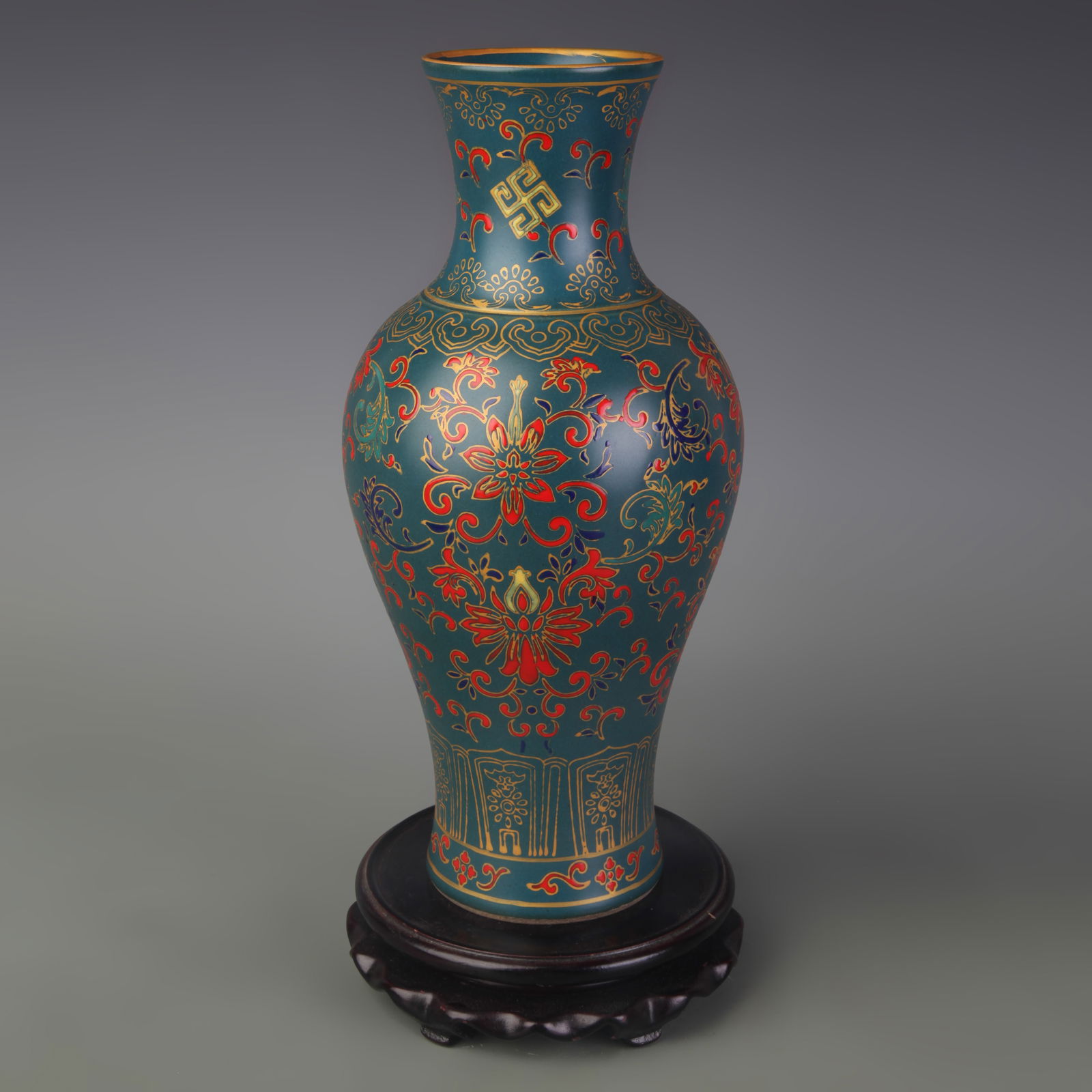 GREEN COLOR GLAZED AND ENAMELED FLORAL PATTERN PORCELAIN VASE: Qing Dynasty Yong Zheng Period; Diameter: 2.8 inch; High: 10.4 inch