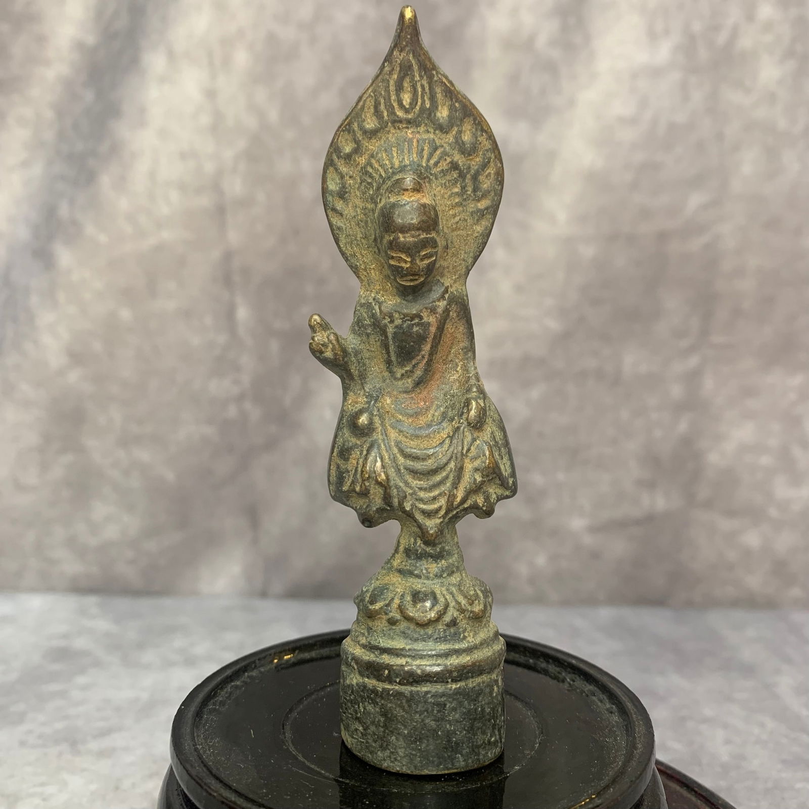 A FINE SMALL BRONZE TIBETAN BUDDHA STATUE: Qing Dynasty; High: 4.4 inch; Width: 1.2 inch
