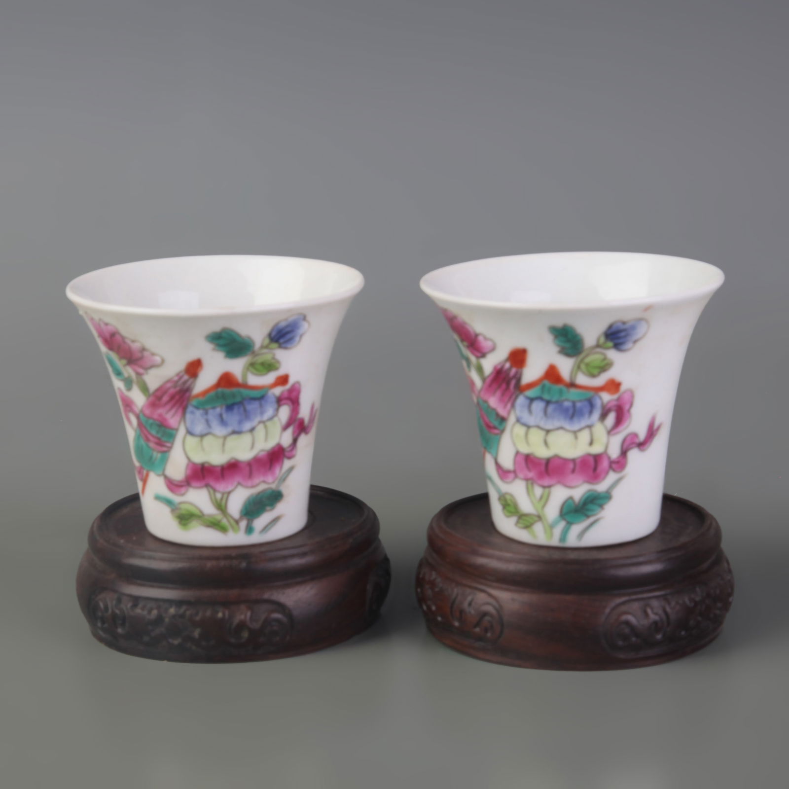 PAIR OF FAMILLE ROSE FLORAL-PATTERNED SMALL TEACUPS: Qing Dynasty; Guang Xu Period; Diameter: 2.8 inch; High: 2.4 inch