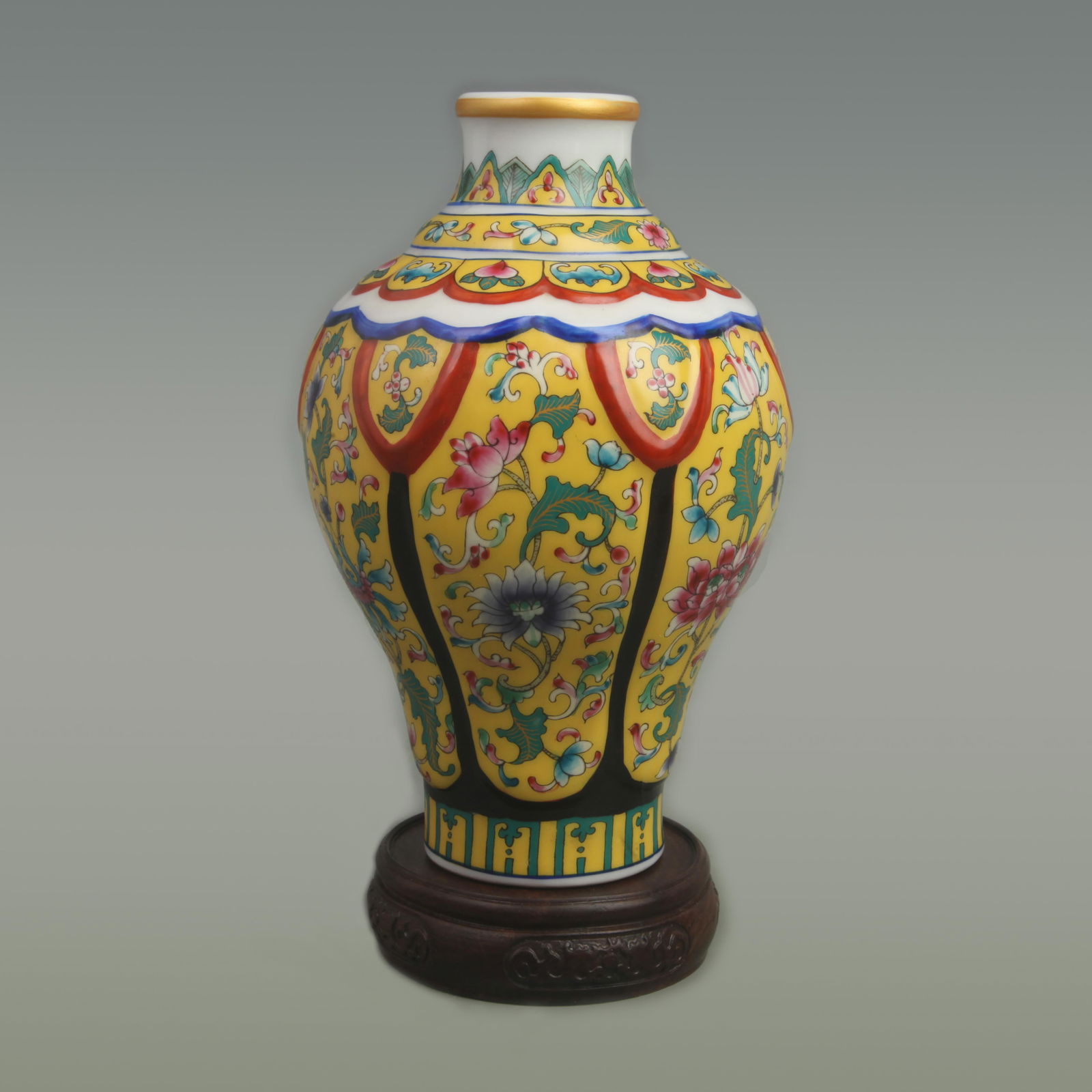 RARE FAMILLE ROSE YELLOW GROUND FLOWER PATTERN MEI BOTTLE: Qing Dynasty Qian Long Period; High: 8 inch; Width: 5.5 inch;