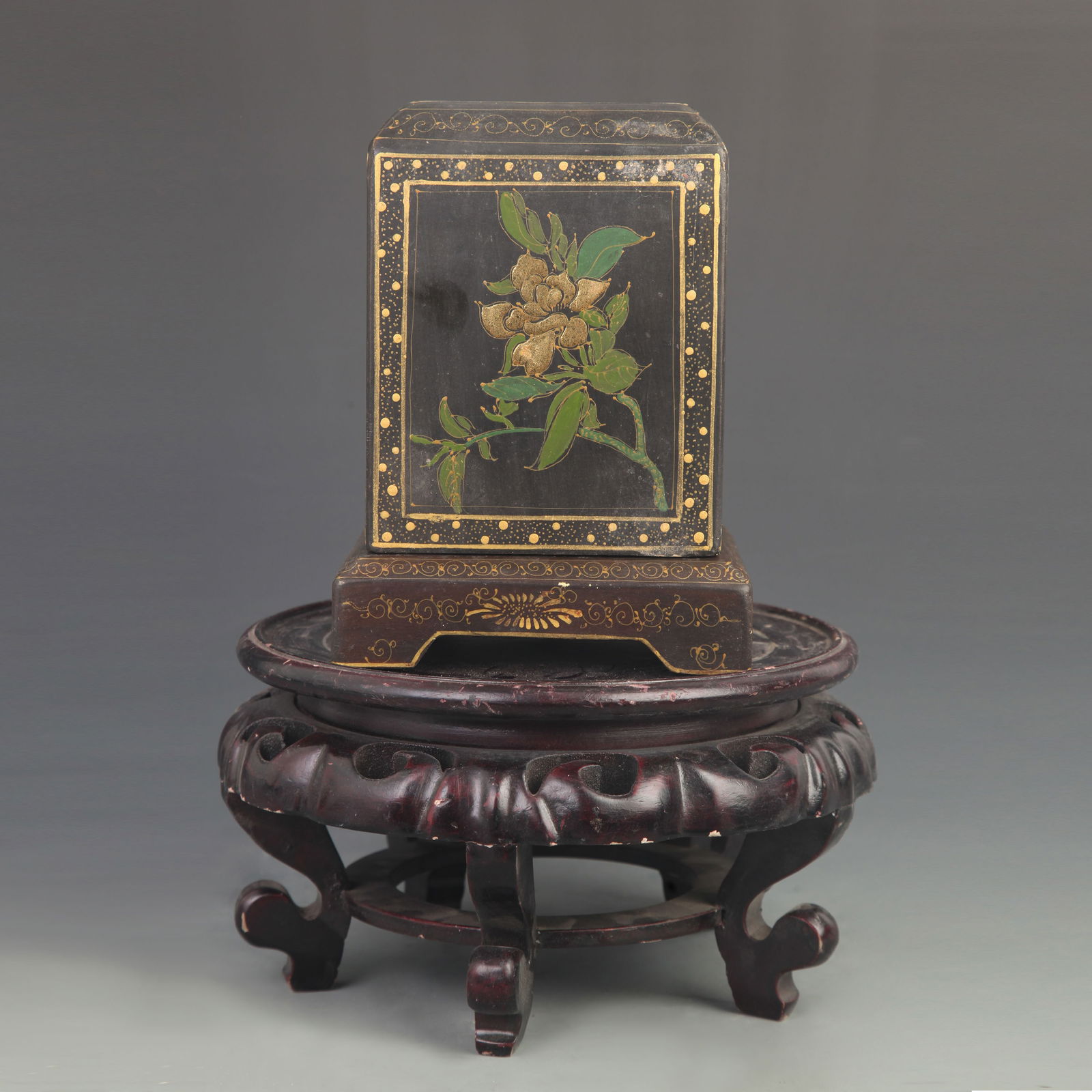 GILT-DECORATED LACQUER WOODEN SEAL BOX WITH FLORAL MOTIF: Qing Dynasty; High: 7.50 inch; Width: 4.75 inch
