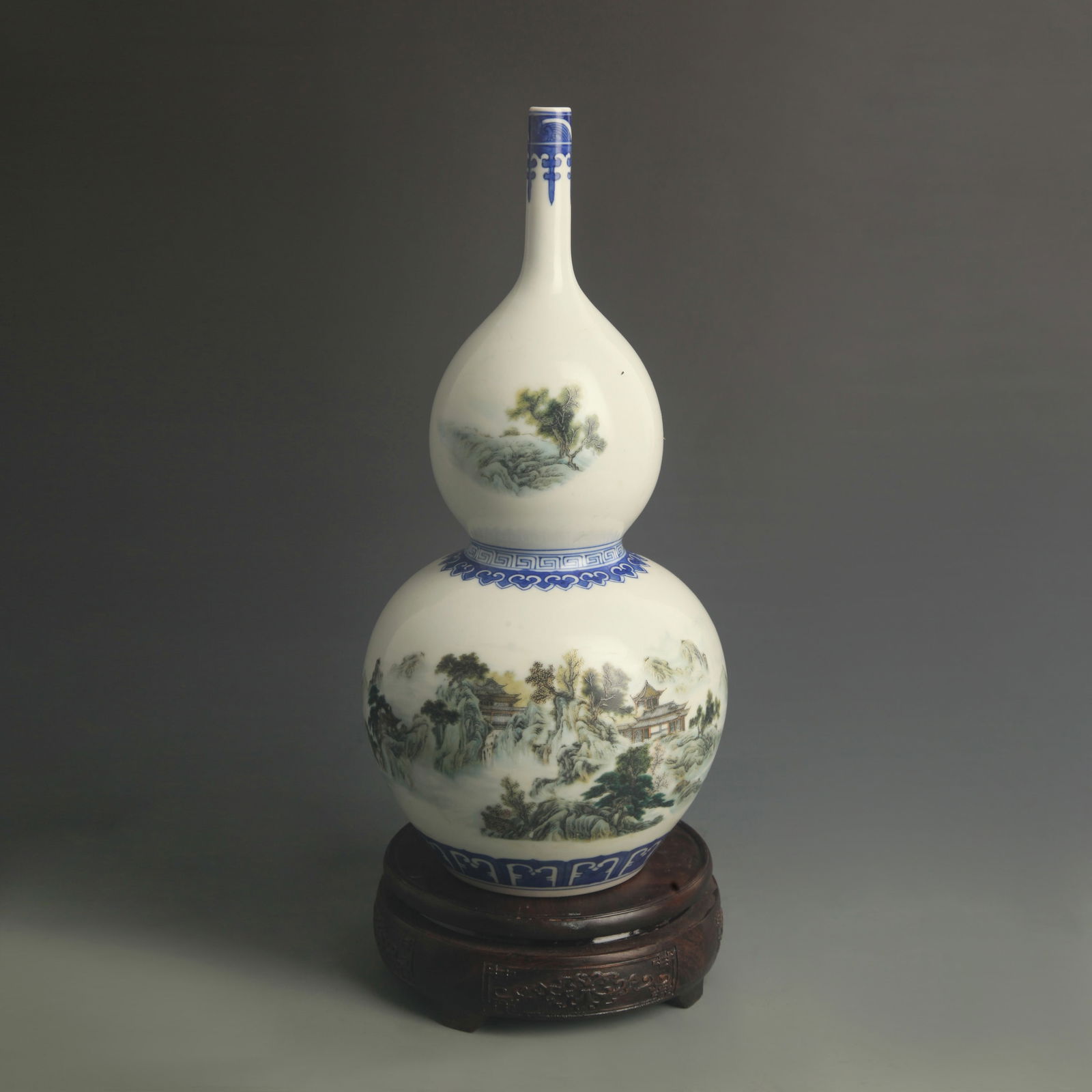 FAMILLE ROSE LANDSCAPE LONG-NECK DOUBLE-GOURD PORCELAIN VASE: Qing Dynasty Qian Long Period; High: 12.0 inch; Diameter: 5.50 inch