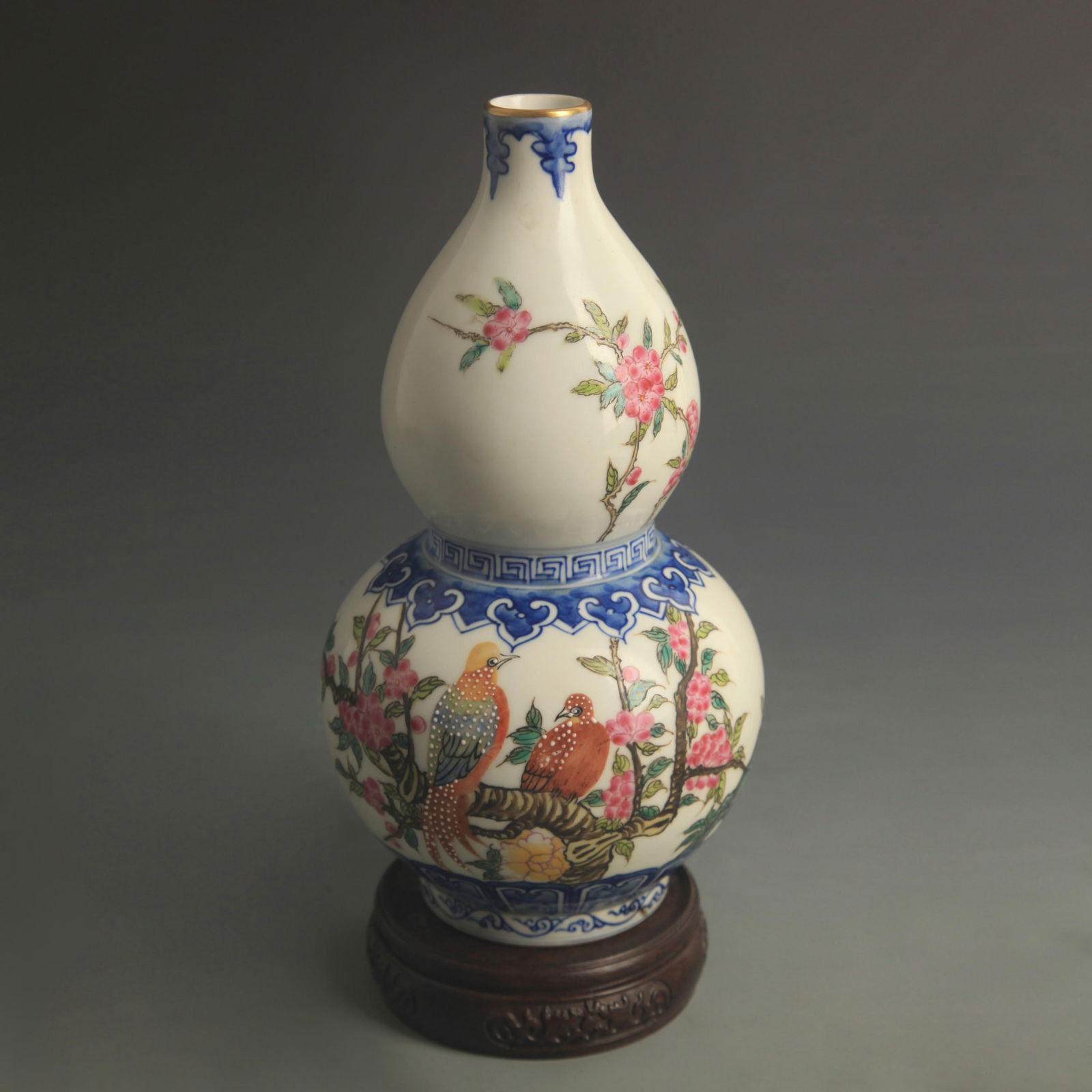 FAMILLE ROSE ENAMEL COLOR FLORAL AND BIRD DOUBLE-GOURD PORCELAIN VASE: Qing Dynasty Qian Long Period; High: 8.80 inch; Diameter: 4.50 inch