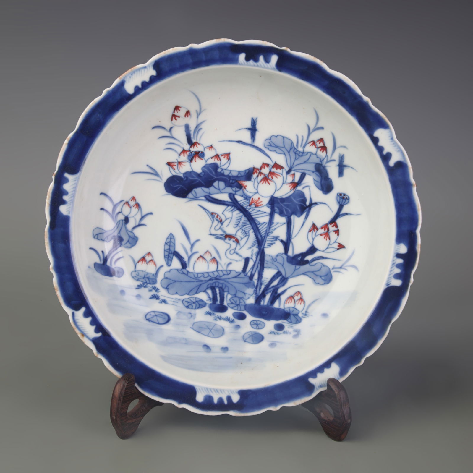 BLUE AND WHITE UNDERGLAZE RED FLORAL AND BIRD PORCELAIN DISH: Qing Dynasty; Kang Xi Period; Diameter: 8.7 inch