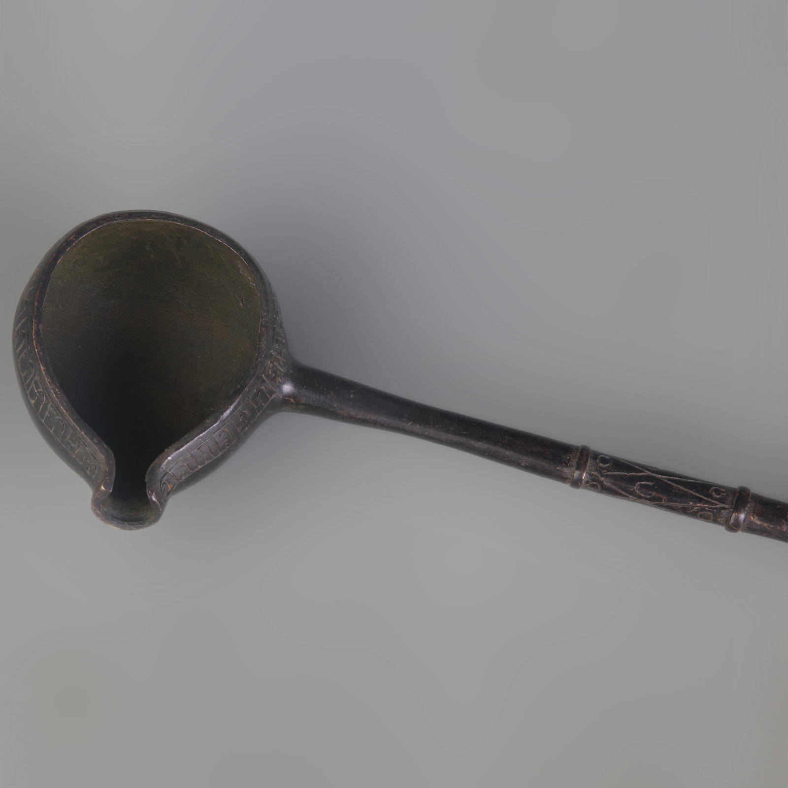 A LONG BRONZE MEASURING SPOON - 2