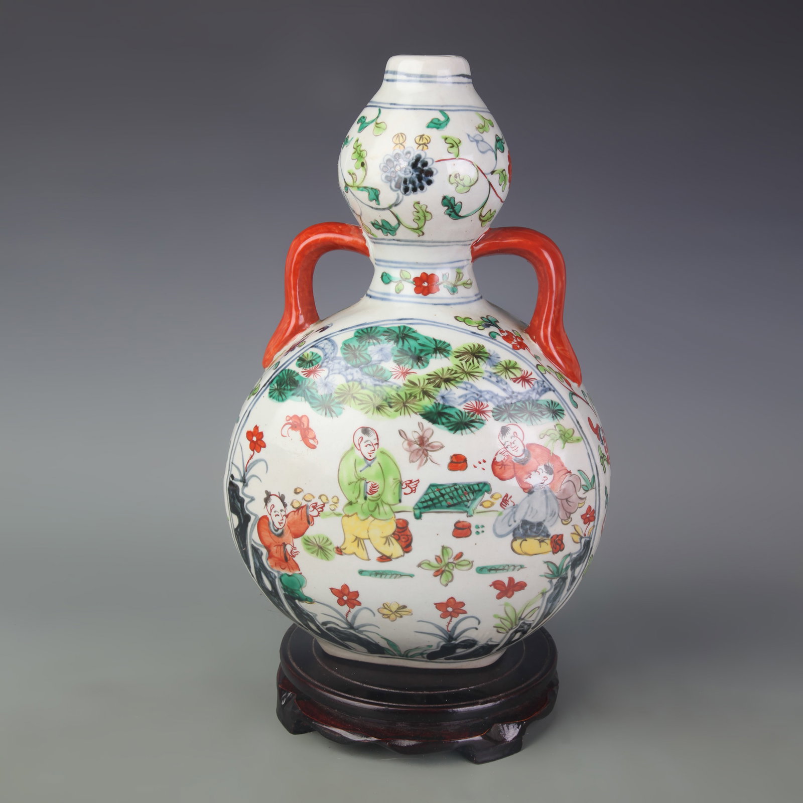 A WUCAI ‘FIGURAL’ PATTERN PORCELAIN MOON FLASK: Ming Dynasty Xuan De Style; Width: 8.5 inch; High: 14.0 inch