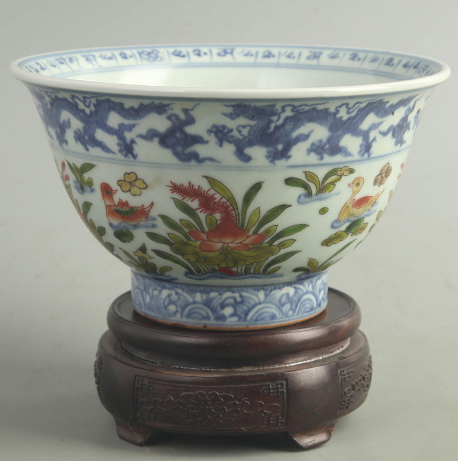A WUCAI FLORAL MANDARIN DUCK PATTERN PORCELAIN BOWL: Ming Dynasty Xuan De Style; High: 4.00 inch; Diameter: 7.30 inchck