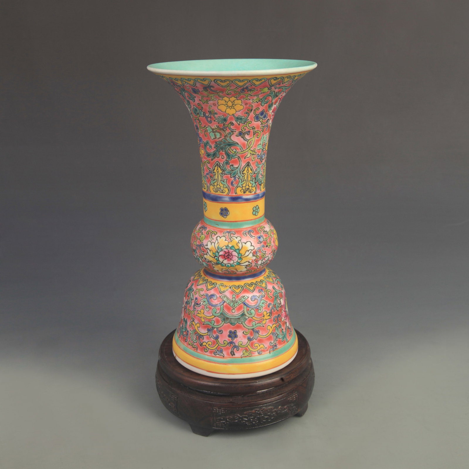 RED GROUND FAMILLE ROSE PORCELAIN FLOWER VASE: Qing Dynasty Qian Long Period; High: 9.60 inch; Diameter: 5.50 inch;