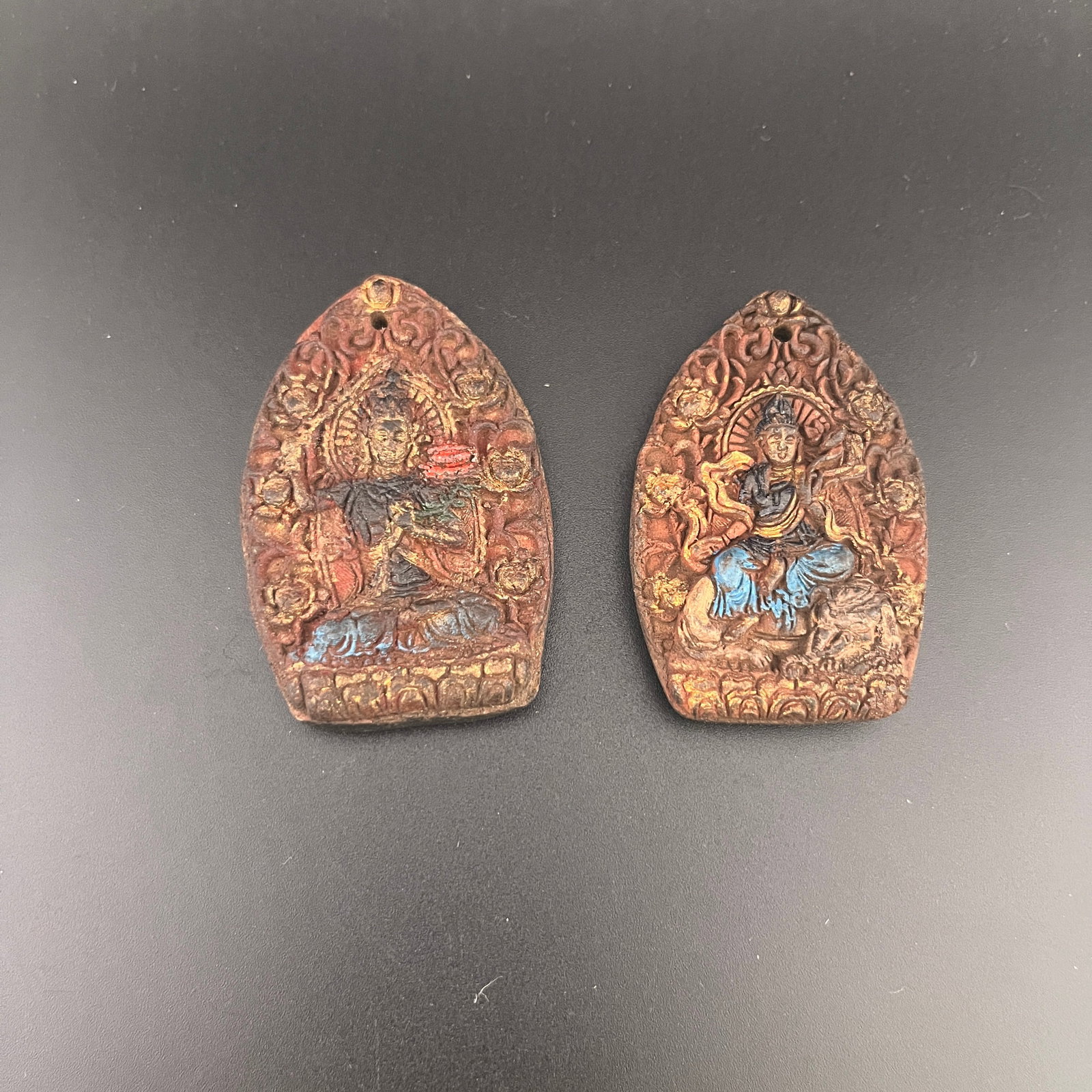 GROUP OF CHINESE HERBAL AND MEDICINE WOOD MADE TIBETAN BUDDHIST AMULET PENDANTS: 20th Century; Long: 2.58 inch; Width: 1.6 inch; High: 0.48 inch; Long: 2.4 inch; Width: 1.61 inch; High: 0.48 inch;