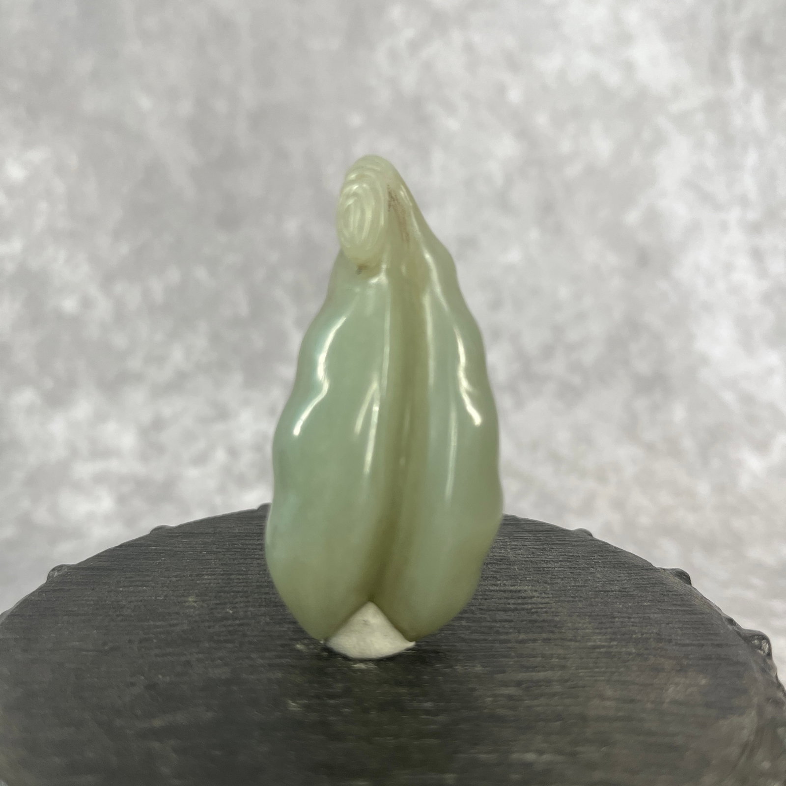 A FINE HETIAN CELADON WHITE JADE IN FIGURE OF BUDDHA'S HAND CITRON FRUIT: Qing Dynasty; Long: 2.4 inch; Width: 1.13 inch; High: 0.67 inch;