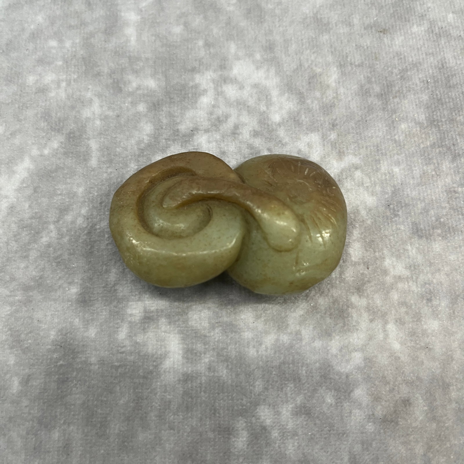 A FINE HETIAN JADE IN FIGURE OF MUSHROOM: Qing Dynasty; Long: 2.38 inch; Width: 1.62 inch; High: 0.78 inch;