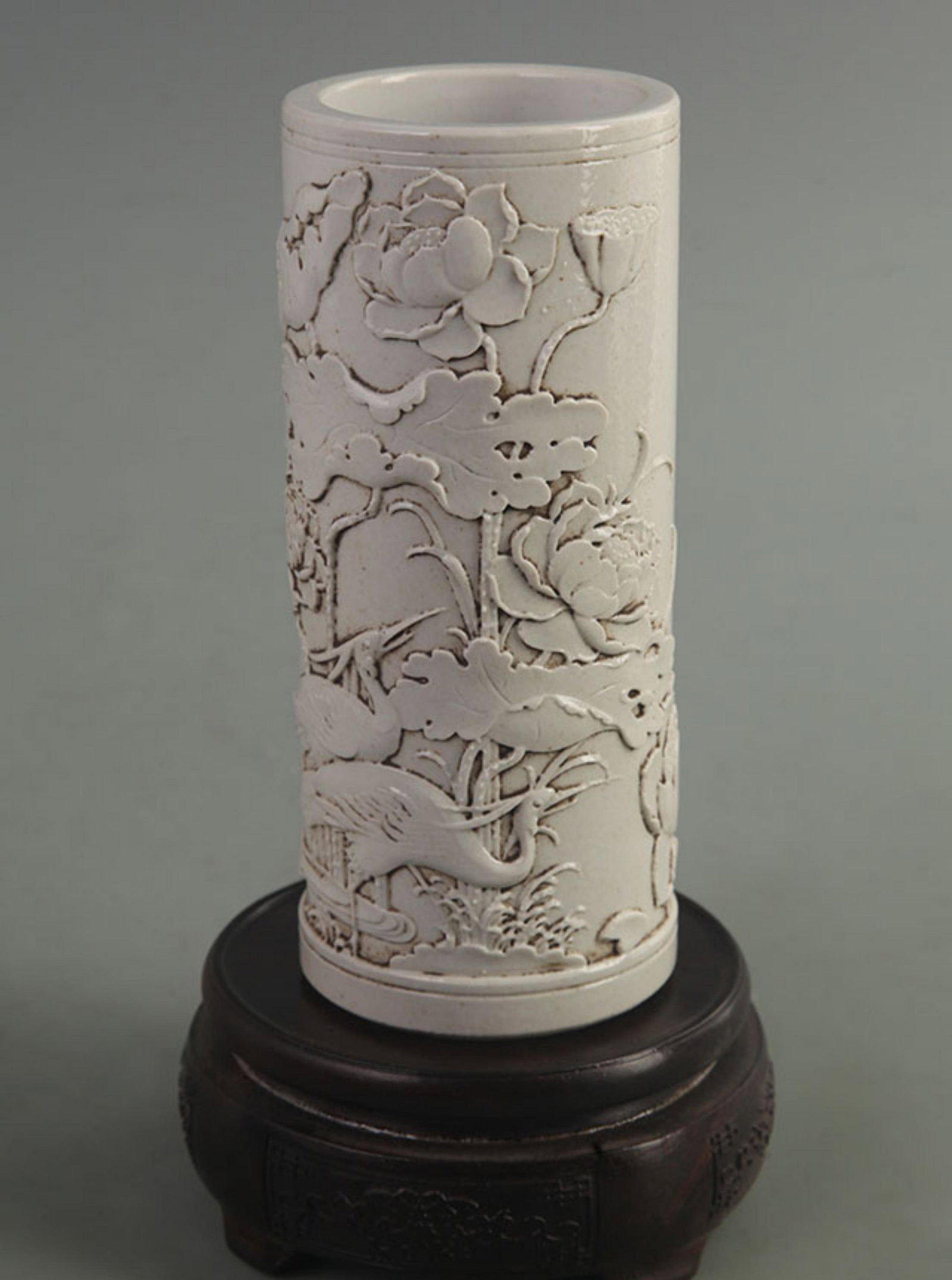 WANG BINGRONG CARVED AUSPICIOUS BIRD AND LOTUS PORCELAIN PEN HOLDER: Qing Dynasty; High: 6.80 inch; Diameter: 3.00 inch;