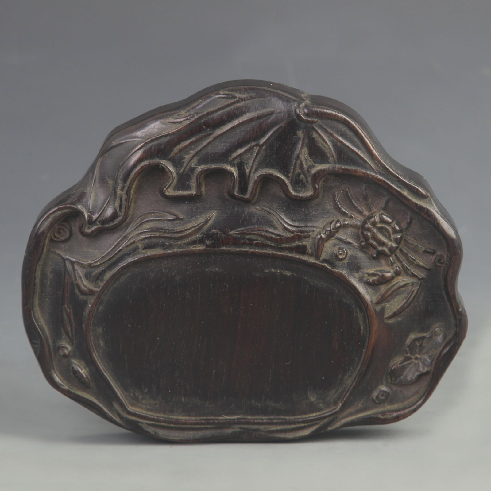 EBONY CARVED "PROSPERITY AND FORTUNE" INKSTONE: 20th Century; High: 0.75 inch; Width: 4.75 inch; Long: 5.50 inch;
