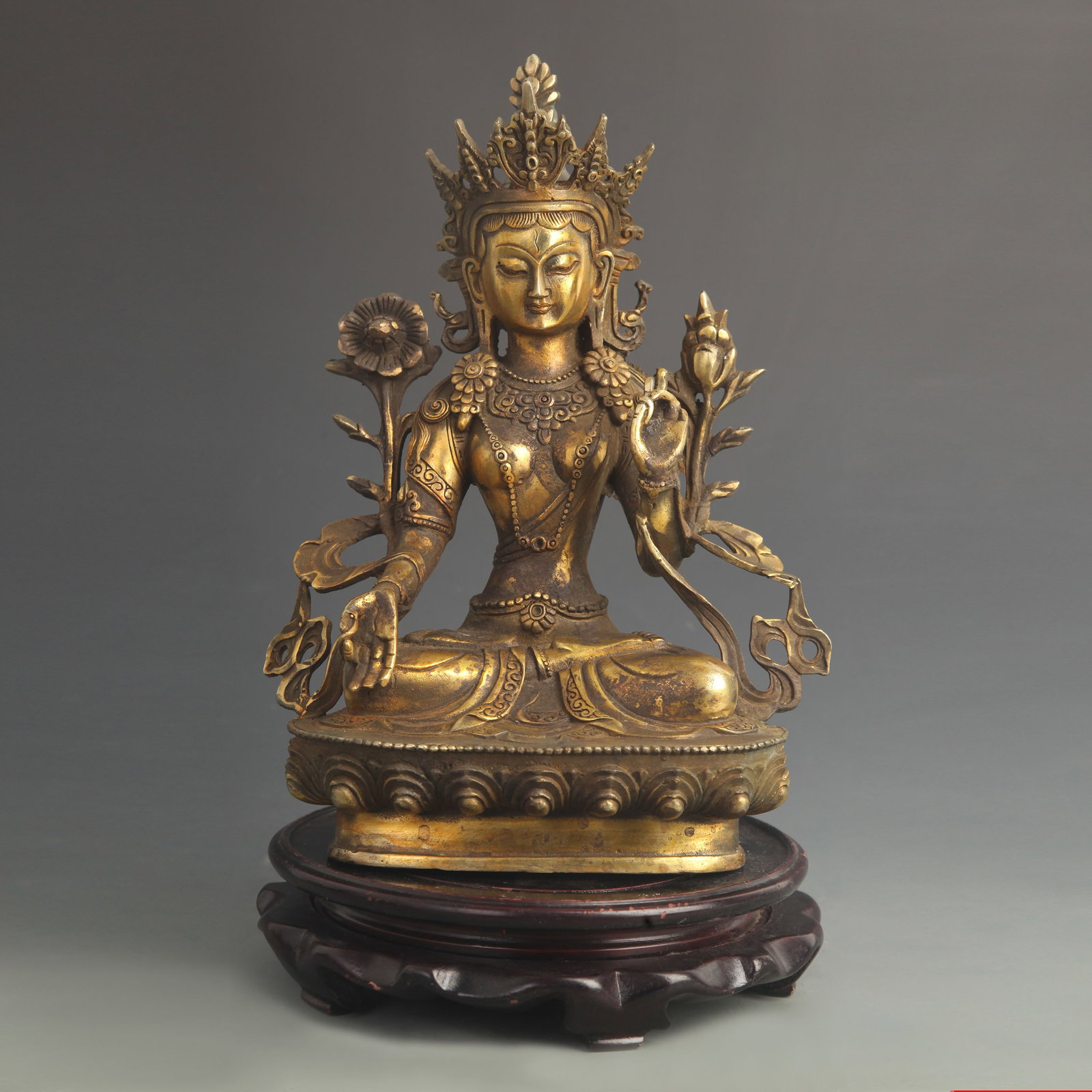 A TIBETAN BRONZE FIGURE OF WHITE TARA: Qing Dynasty; High: 11.0 inch; Width: 8.25 inch