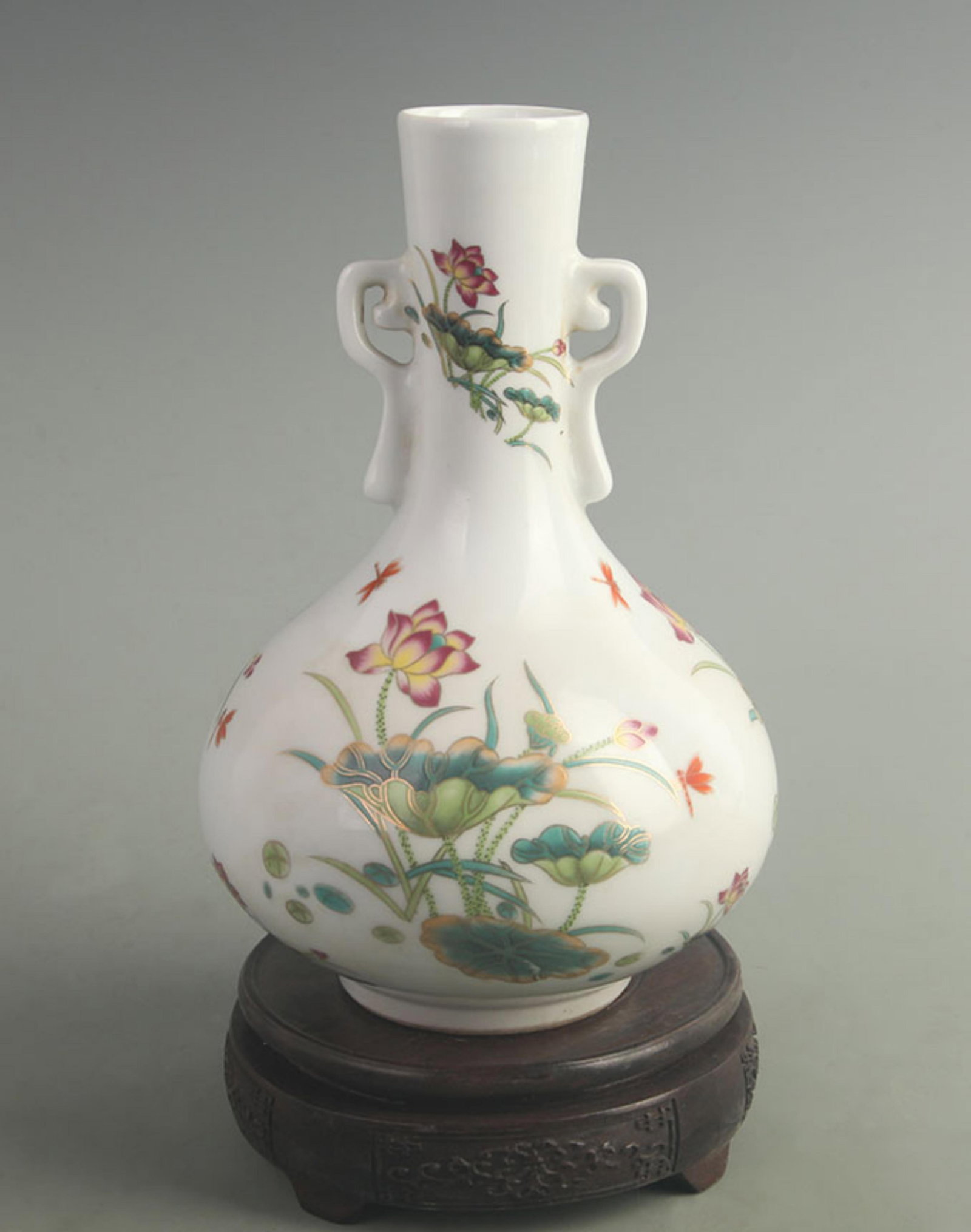 FAMILLE ROSE LOTUS FLOWER DOUBLE-EARED FLAT-BELLIED VASE: Qing Dynasty Yongzheng Period; High: 9.00 inch; Width: 5.20 inch;
