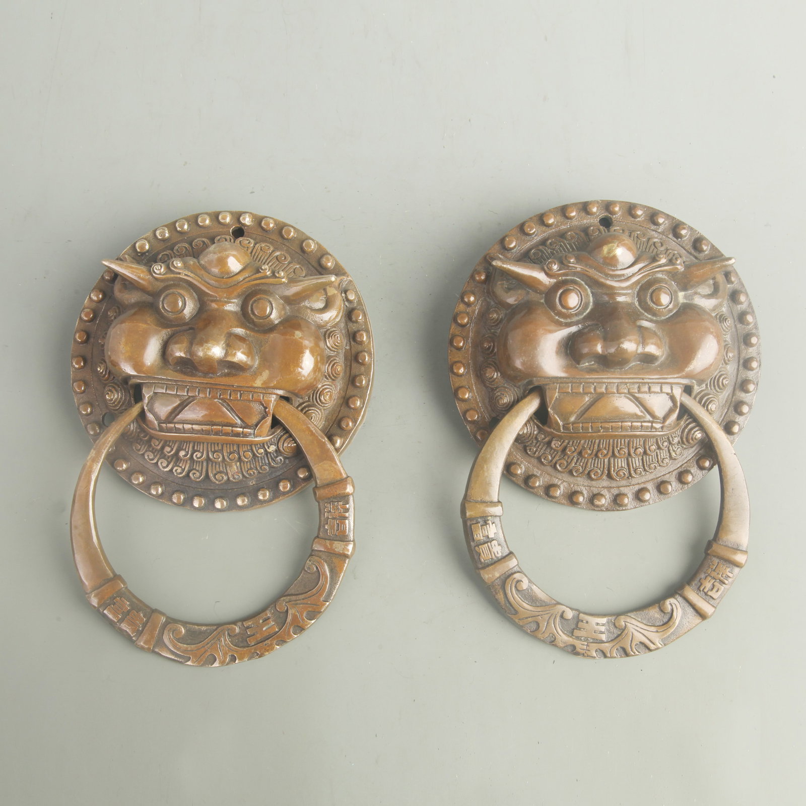 PAIR OF BRONZE BRONZE FOO DOG STYLE DOOR KNOCKERS: Qing Dynasty; Long: 5.00 inch;