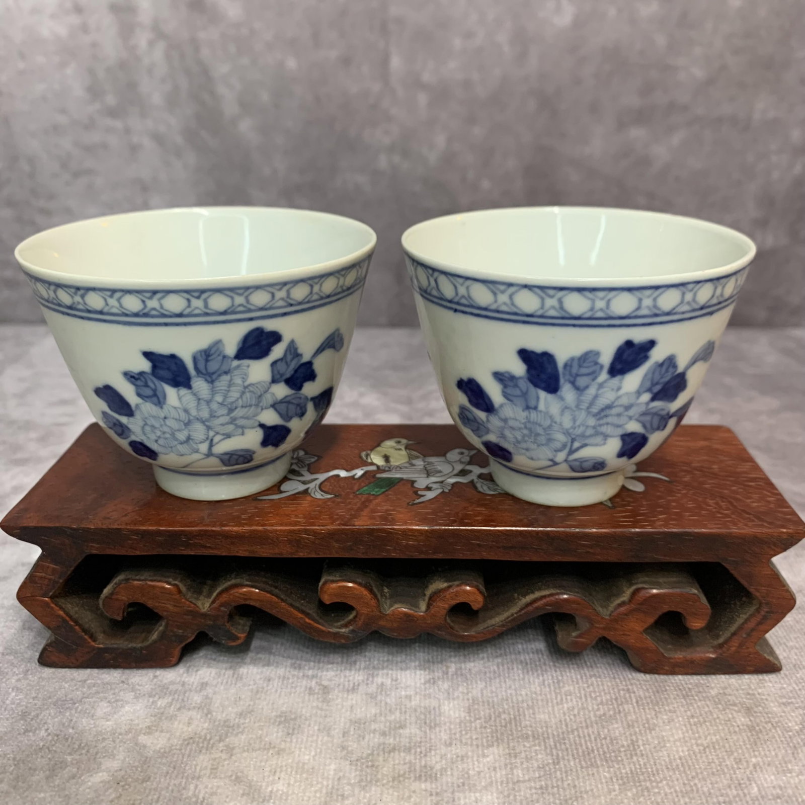 PAIR BLUE AND WHITE PEONY PATTERN PORCELAIN TEACUPS: 20th Century; High: 2.3 inch; Diameter: 2.9 inch