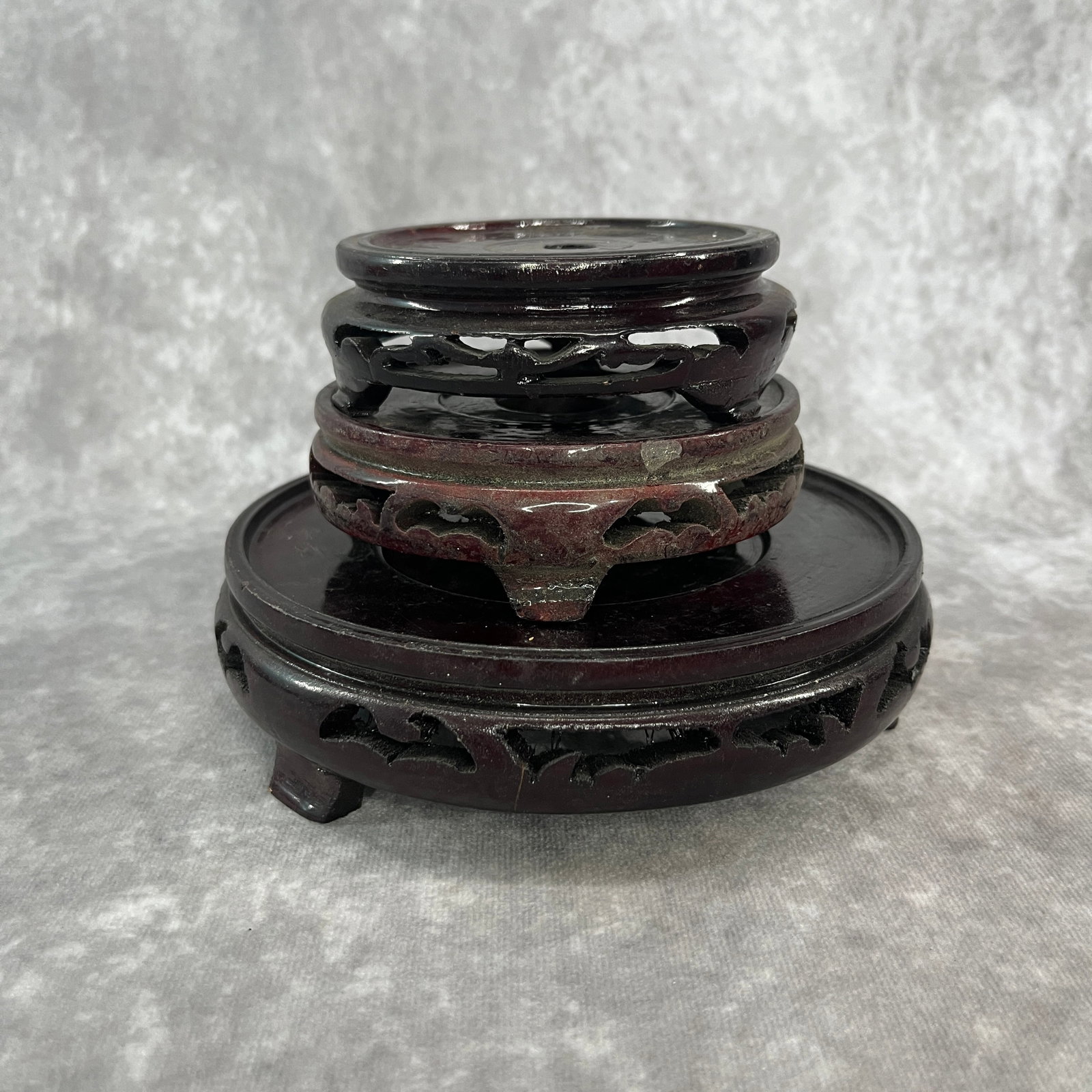 GROUP OF HARDWOOD MADE DISPLAY STAND: Modern; High: 1.4 inch; Diameter: 4.5 inch; High: 1.8 inch; Diameter: 6.5 inch; High: 1.35 inch; Diameter: 4.1 inch;