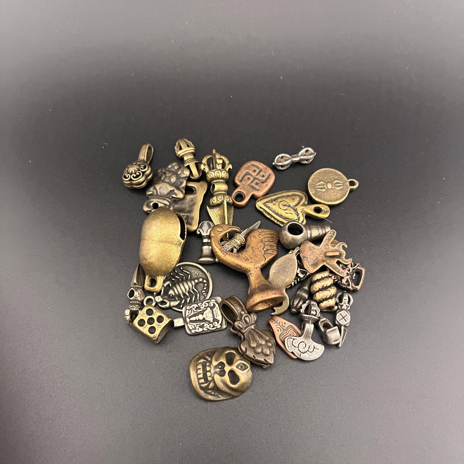 GROUP OF SMALL TIBETAN BUDDHIST RITUAL INSTRUMENTS: Modern; Long: 0.77 inch to 1.55 inch; Diameter: 0.3 inch to 0.4 inch;