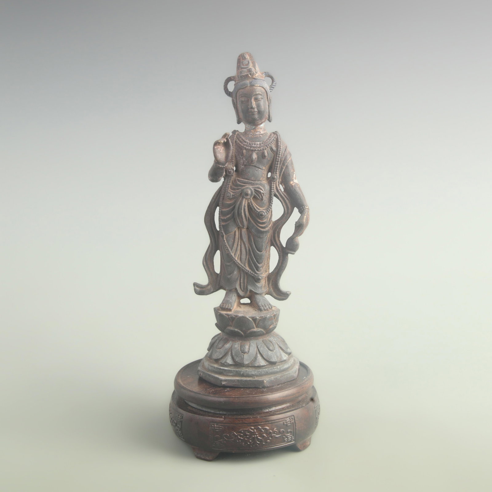 A GILT-BRONZE STANDING FIGURE OF GUANYIN: 19th Century; High: 9.70 inch; Width: 3.10 inch; Long: 3.10 inch