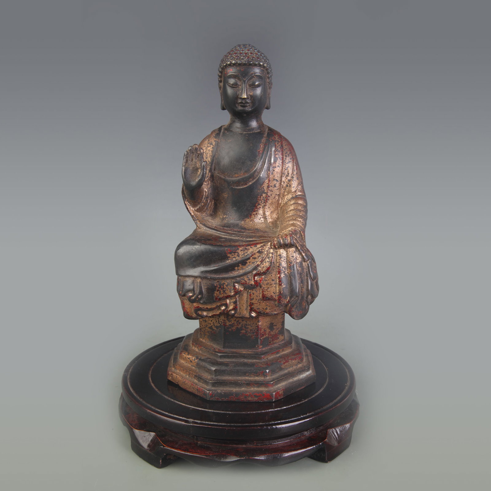 A FIGURE OF BRONZE SHAKYAMUNI BUDDHA: Qing Dynasty; Width: 4.5 inch; High: 9.0 inch
