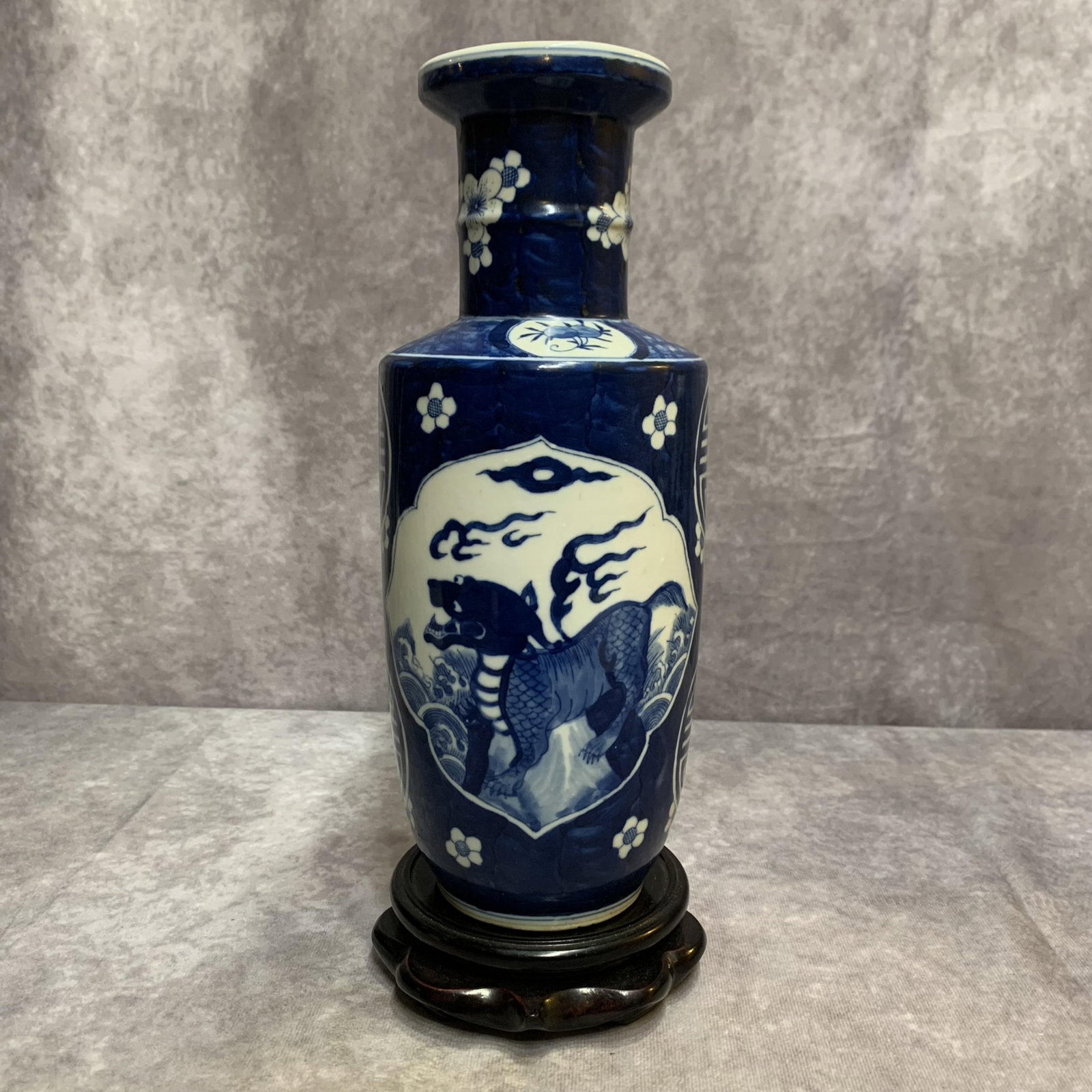 A BLUE AND WHITE BEAST PATTERN PORCELAIN VASE: 20th Century; High: 10.0 inch; Diameter: 4.0 inch