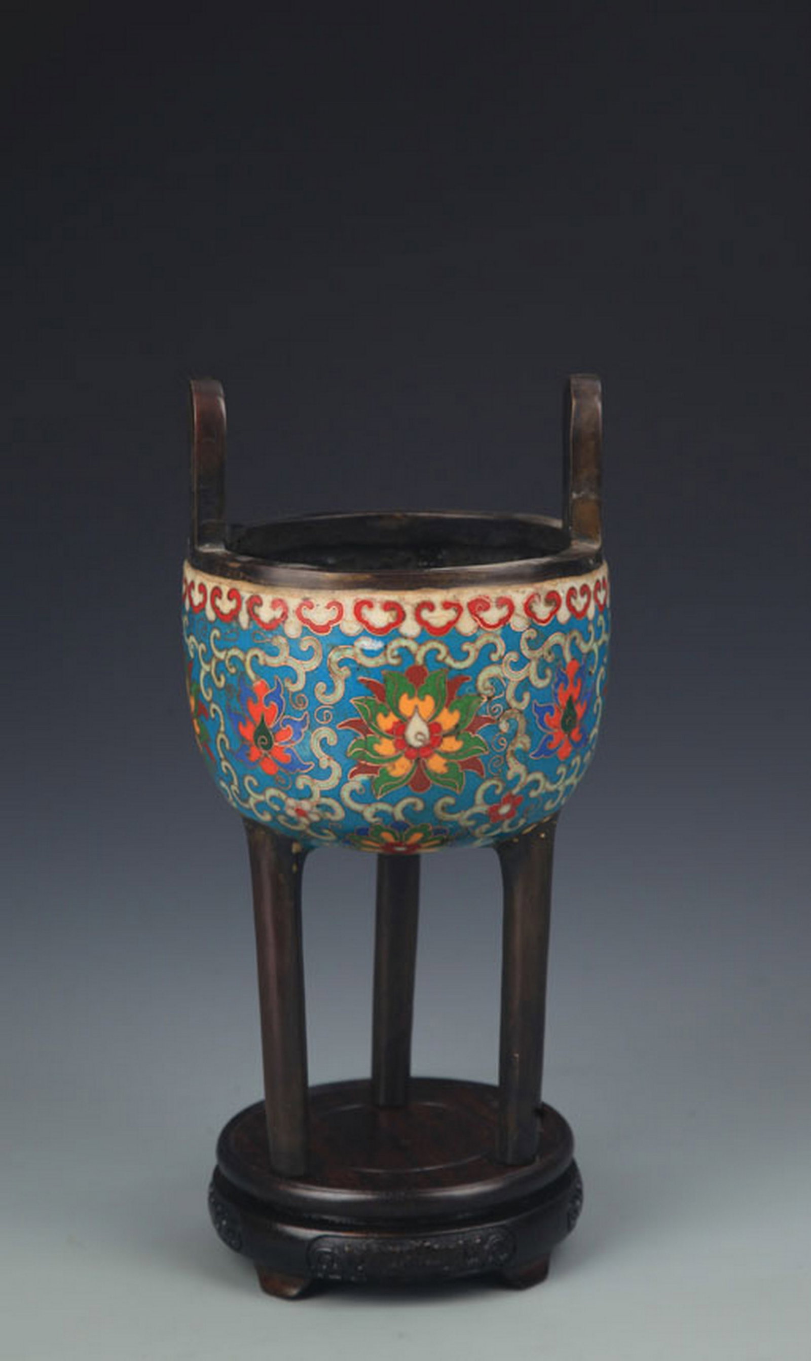 A CLOISONNÉ ENAMEL TRIPOD CENSER WITH DOUBLE STANDING HANDLES: Qing Dynasty; High: 9.5 inch; Diameter: 5.0 inch