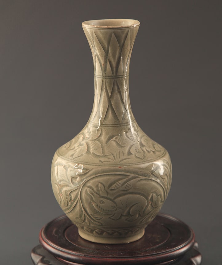 A FINE YAO ZHOU CELADON GLAZED FLOWER CARVING LONG NECK BOTTLE (1 of 5)