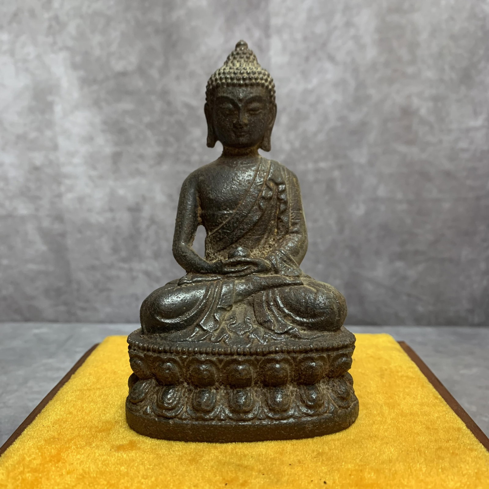 A FINELY CAST IRON GAUTAMA BUDDHA STATUE (1 of 5)