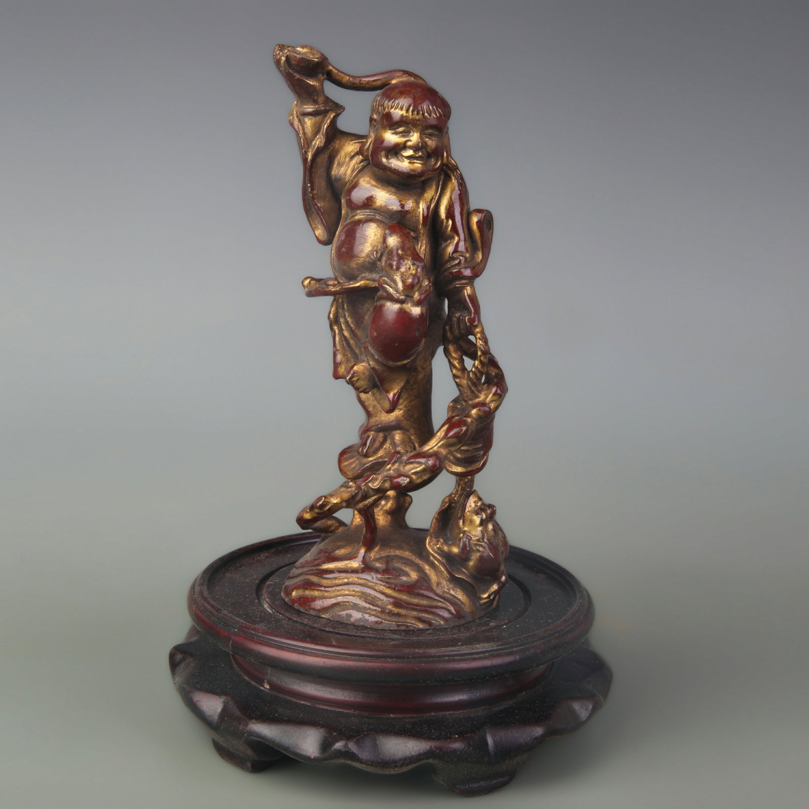 A GILT BRONZE ELDERLY SCHOLAR FIGURE: Qing Dynasty; Width: 2.5 inch; High: 6.3 inch