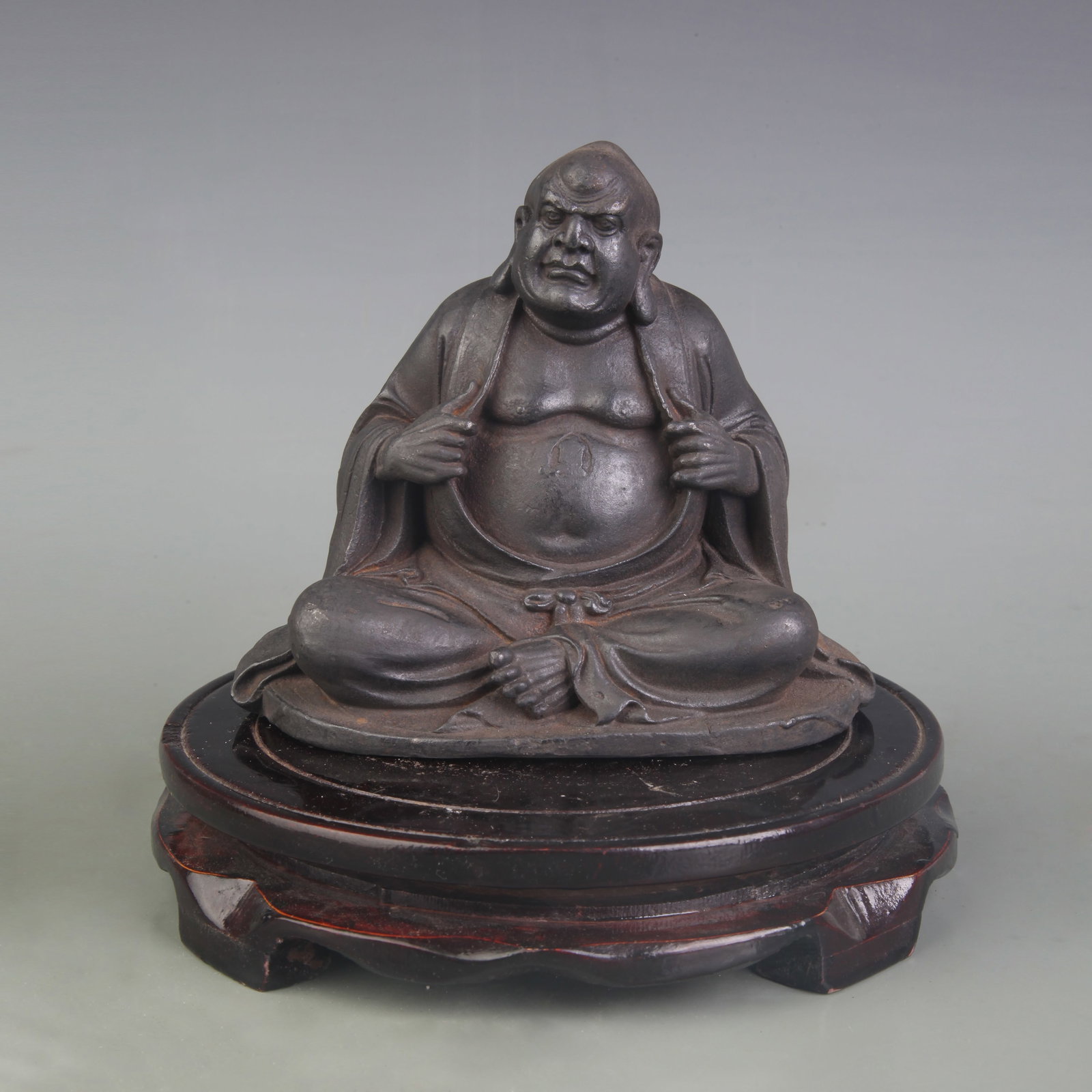 A FINE CAST IRON ARHAT FIGURE: Qing Dynasty; Width: 5.8 inch; High: 5.0 inch