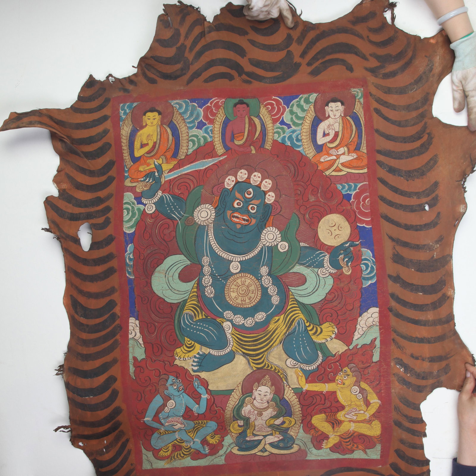 A RARE TIBETAN SHEEPSKIN MAHAKALA THANGKA: Qing Dynasty; Long: 45.0 inch; Width: 32.0 inch;