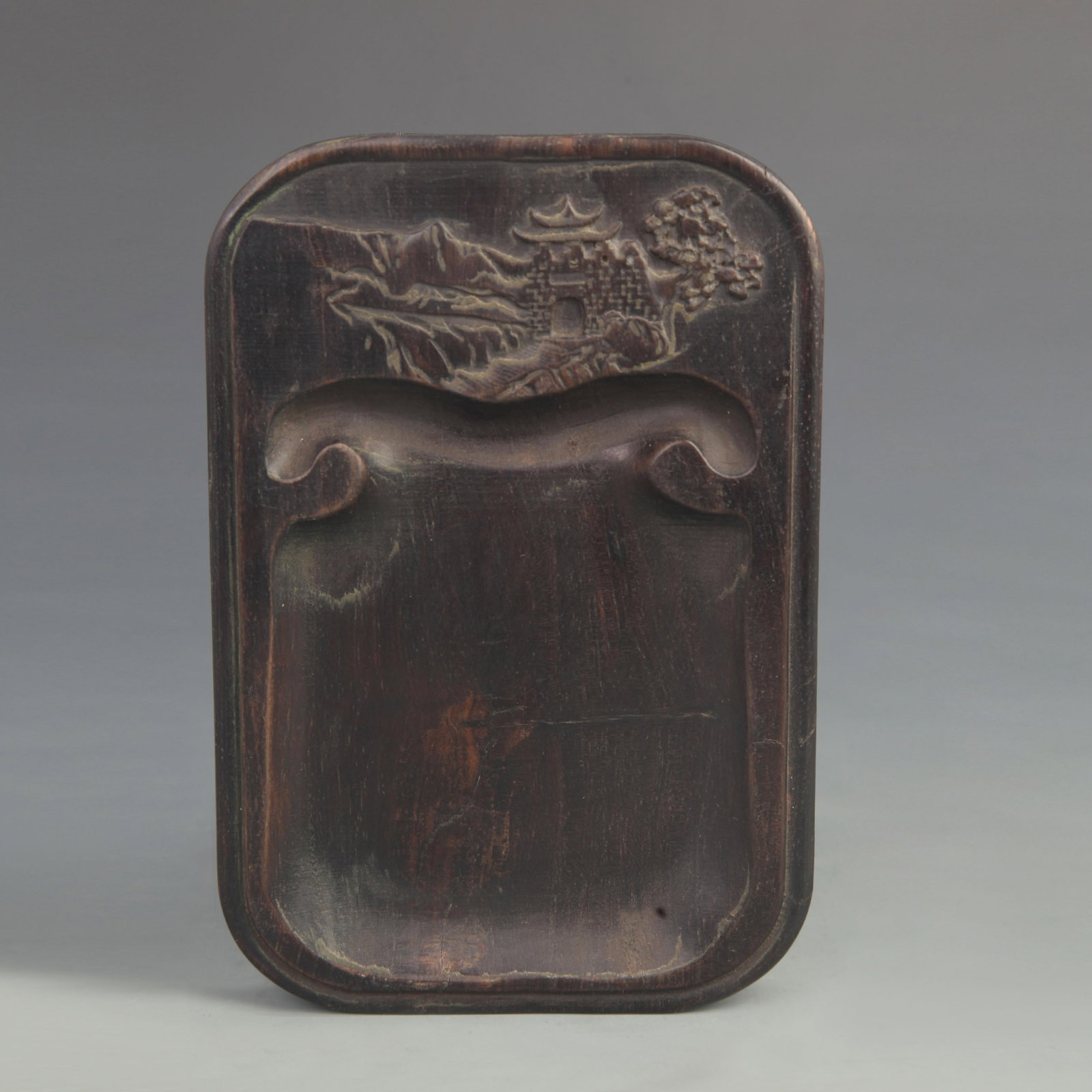 EBONY WOOD CARVED INKSTONE WITH SEA AND DRAGON PATTERNS: 20th Century; Long: 7.00 inch; Width: 4.75 inch;
