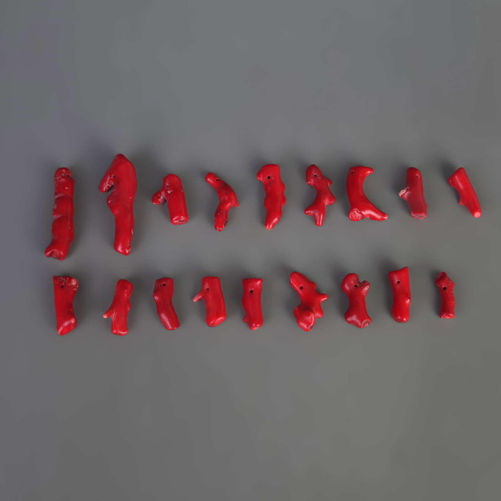 A GROUP OF CORAL PENDANTS: Modern; Long: 1.0 inch to 2.5 inch