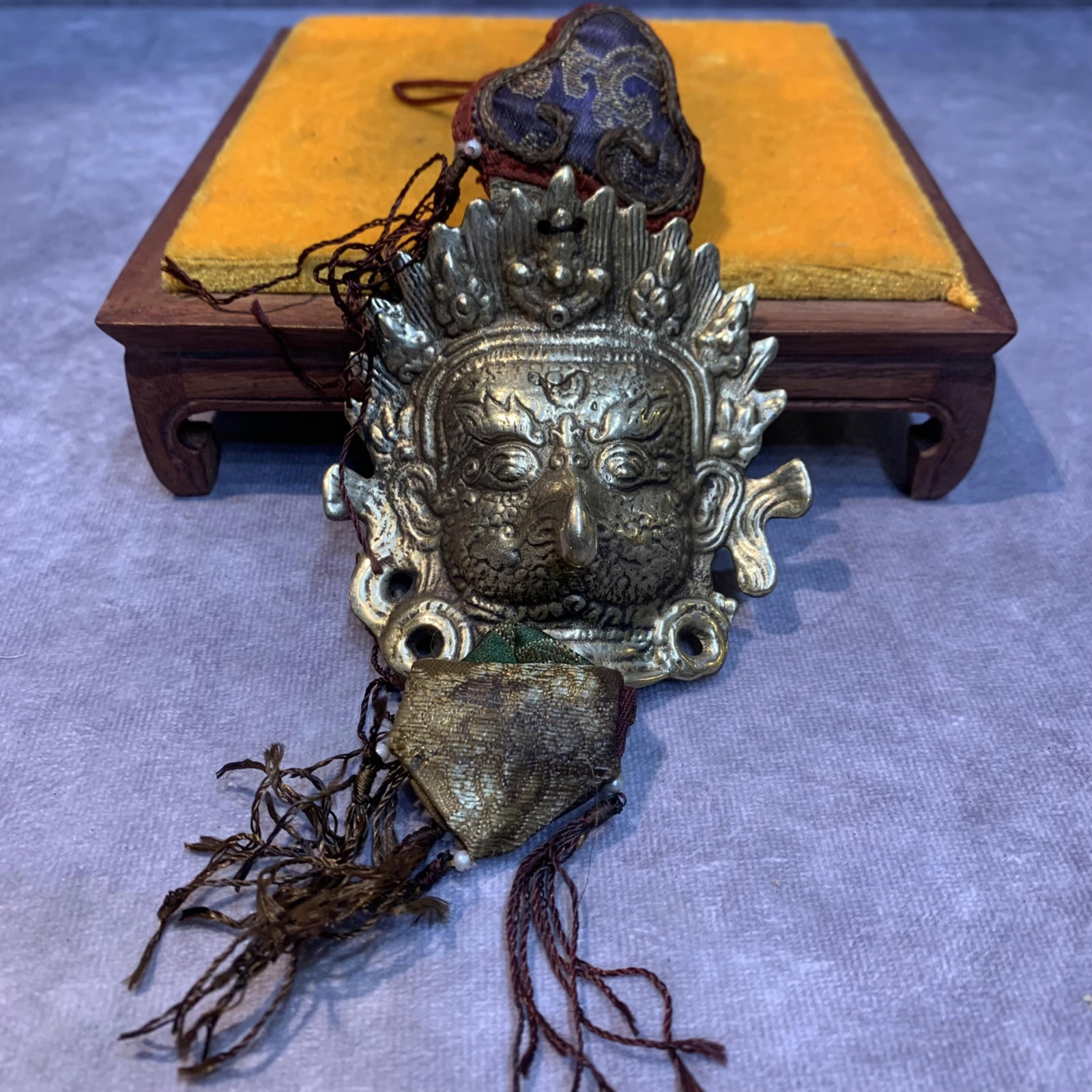 A FINELY CAST TIBETAN BRONZE PENDANT: High: 3.4 inch; Width: 3.3 inch