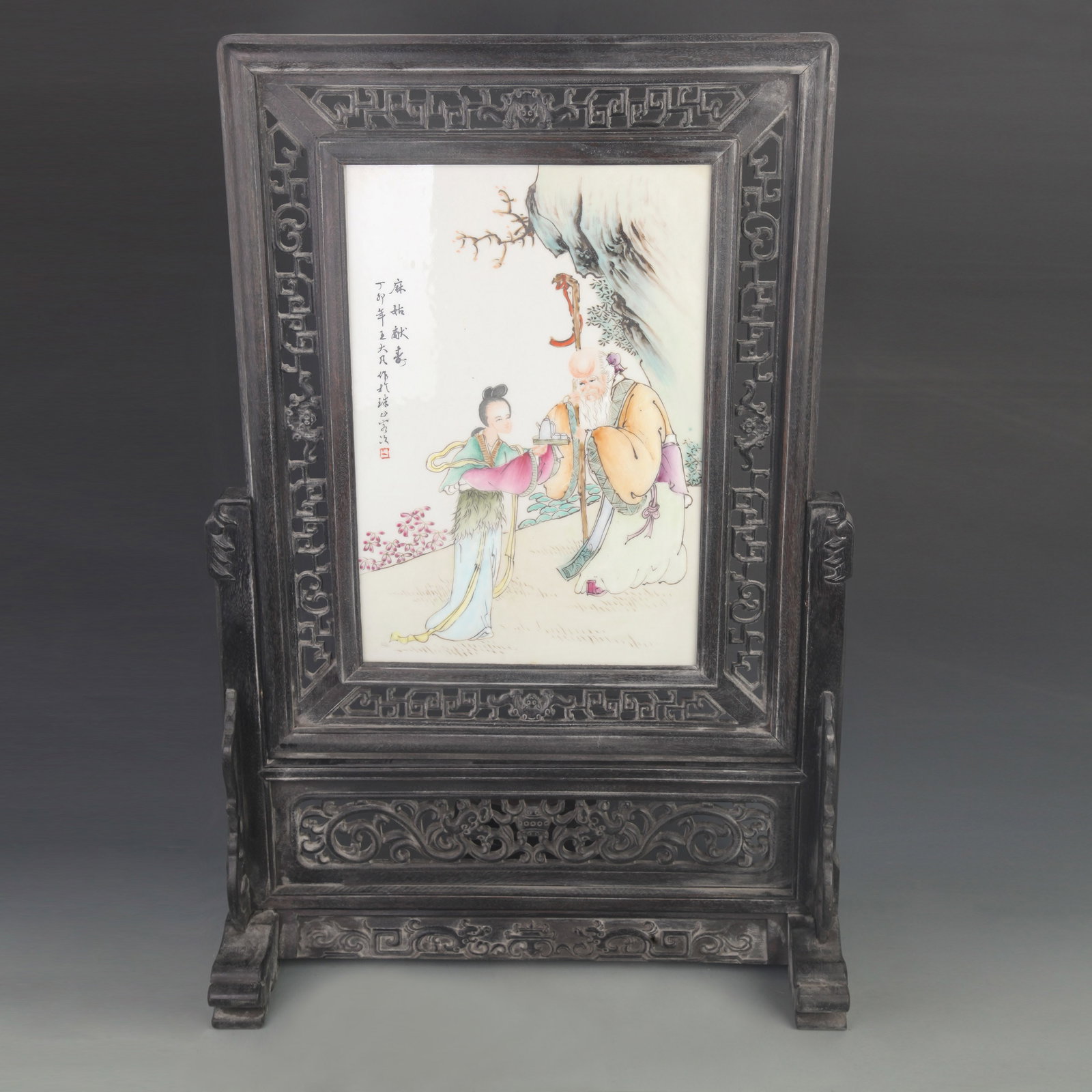 A WANG DAFAN FAMILLE ROSE PORCELAIN PLAQUE DEPICTING MAGU OFFERING LONGEVITY: Republic Period; High: 26.0 inch; Width: 17.7 inch