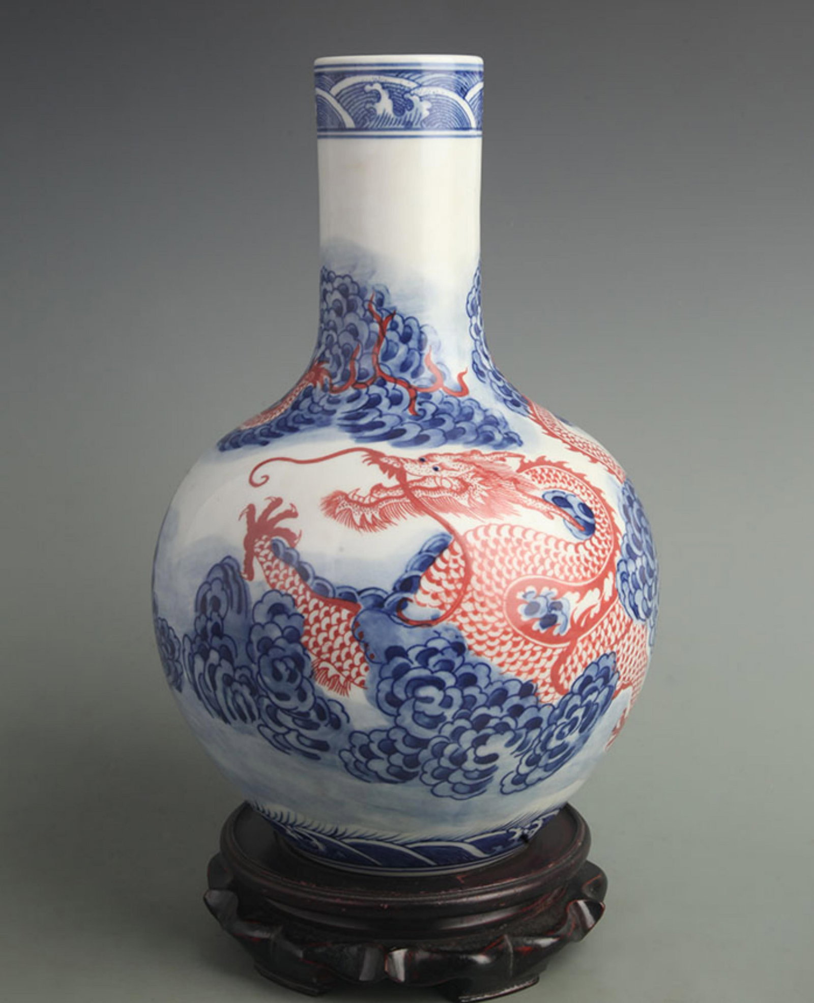 A BLUE AND WHITE UNDERGLAZE RED DRAGON GLOBULAR VASE: Qing Dynasty Yong Zheng Period; High: 12.0 inch; Width: 8.50 inch
