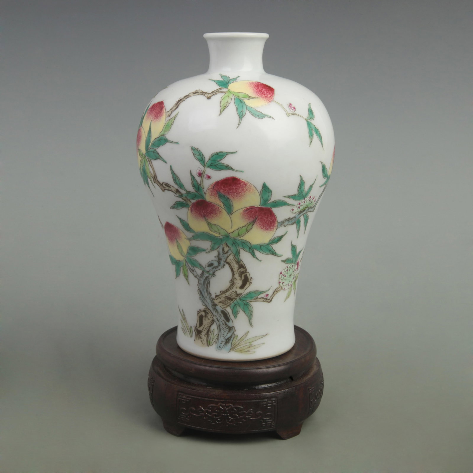 FAMILLE ROSE NINE PEACHES PLUM PATTERN PORCELAIN VASE: Qing Dynasty Qian Long Period; High: 8.3 inch; Width: 5.5 inch;