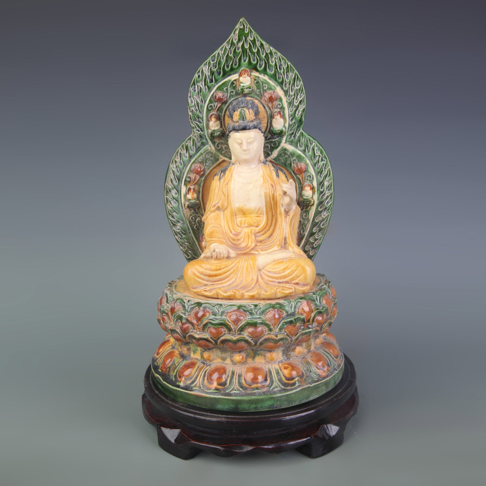 A SAN CAI COLOR SHAKYAMUNI POTTERY FIGURE: Tang Dynasty Style; High: 10.9 inch