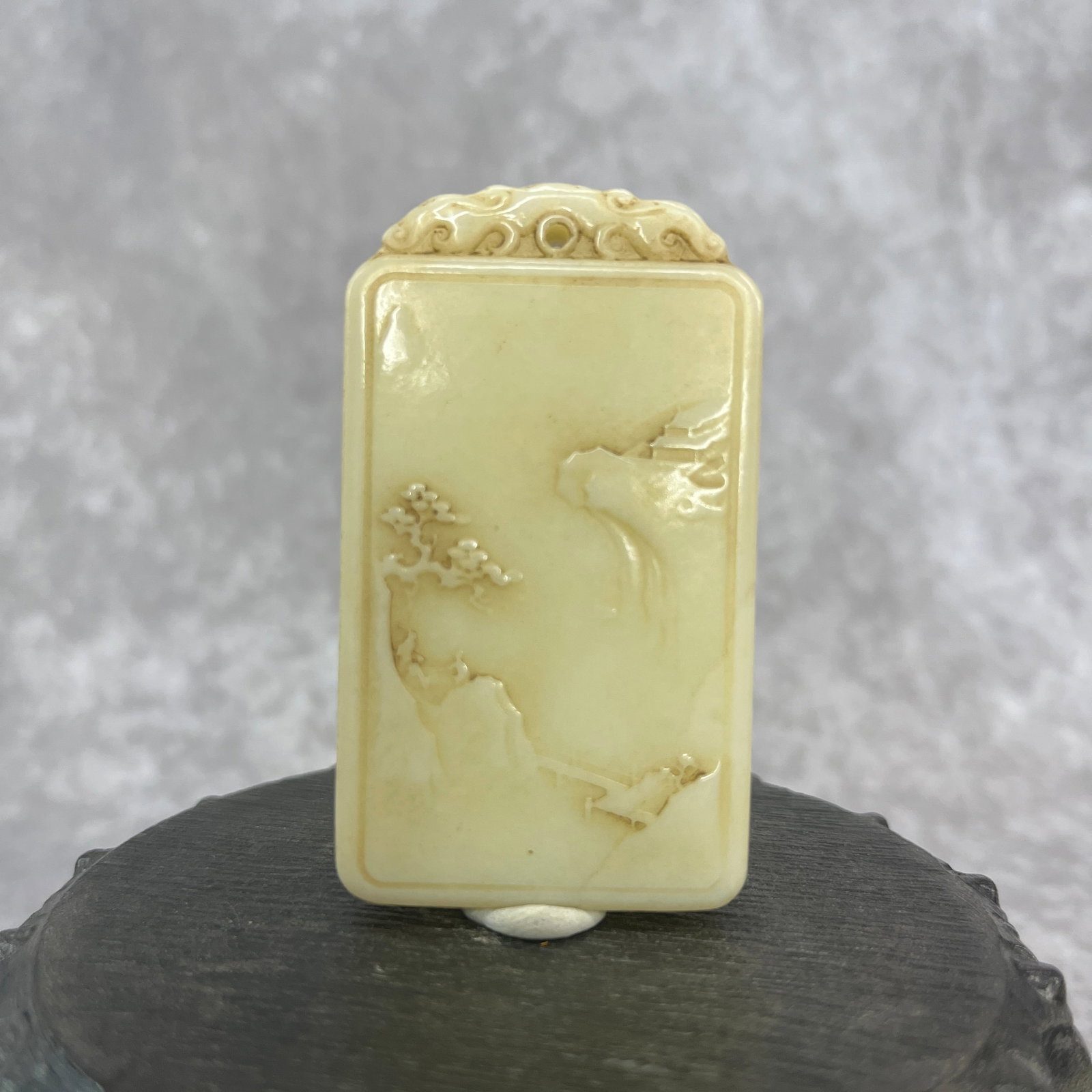A FINE HETIAN JADE PENDANT WITH PINE TREE PATTERN: Qing Dynasty; Long: 2.73 inch; Width: 1.58 inch; High: 0.37 inch;