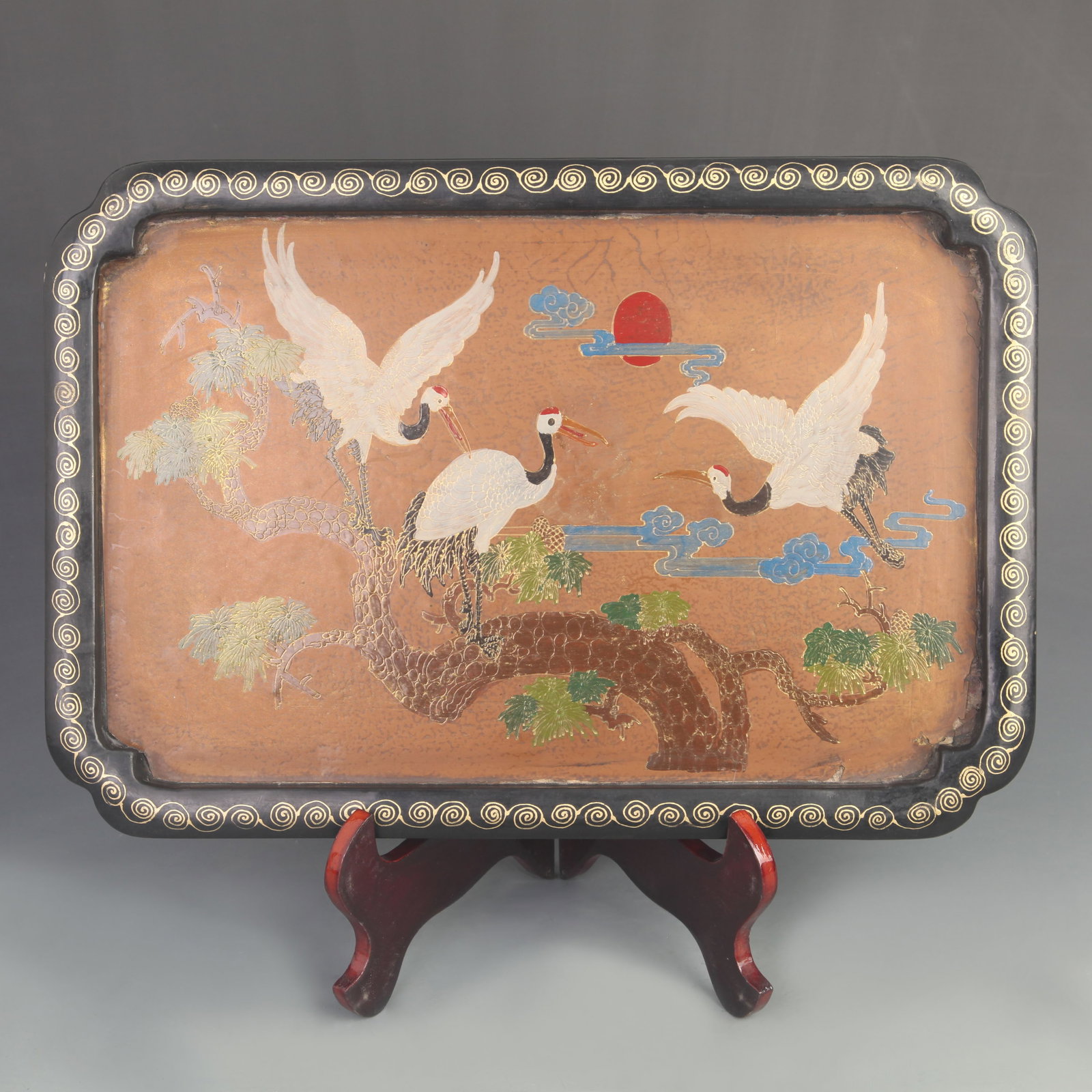LACQUER AND GOLD-PAINTED TRAY WITH PINE, CRANE, AND SUNRISE MOTIF: Qing Dynasty; High: 1.50 inch; Width: 10.5 inch; Long: 15.5 inch;