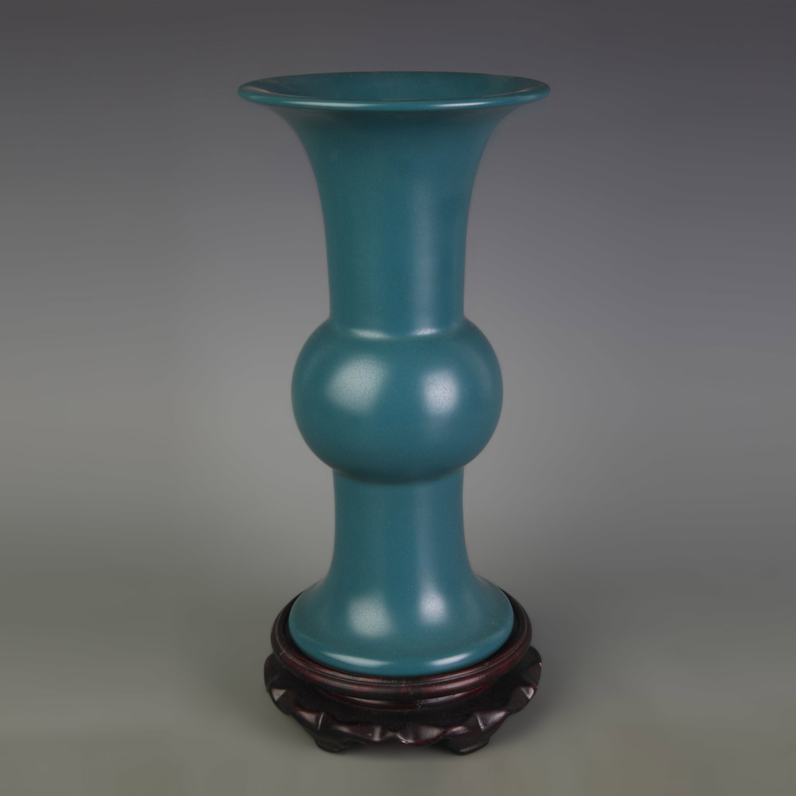 A PEACOCK-BLUE GLAZED GU STYLE PORCELAIN VASE (1 of 5)